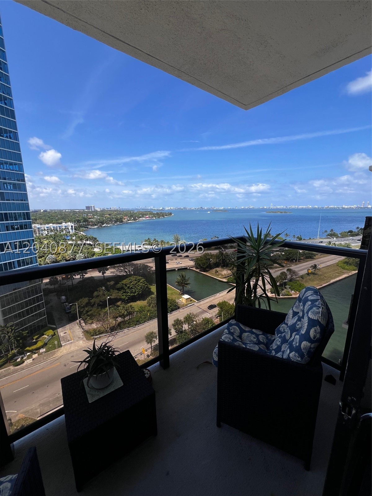 2-Bedrooms and 2 full bathrooms, OPEN BALCONY-INTER COASTAL VIEW. Floor-to-ceiling windows, walk-in closets, washer and dryer in unit. Includes one assigned covered parking space, additional spaces are available, and free guest parking. Waterfront resort-style building with a pool, hot tub, fitness center, tennis courts, basketball courts, handball courts, grill area, party room, business center, convenience store, hair salon, dry cleaner, front desk anttedant with 24-hour security> Located near Midtown and The Design District with easy access to Miami Beach, Downtown, Brickell and the MIA airport.