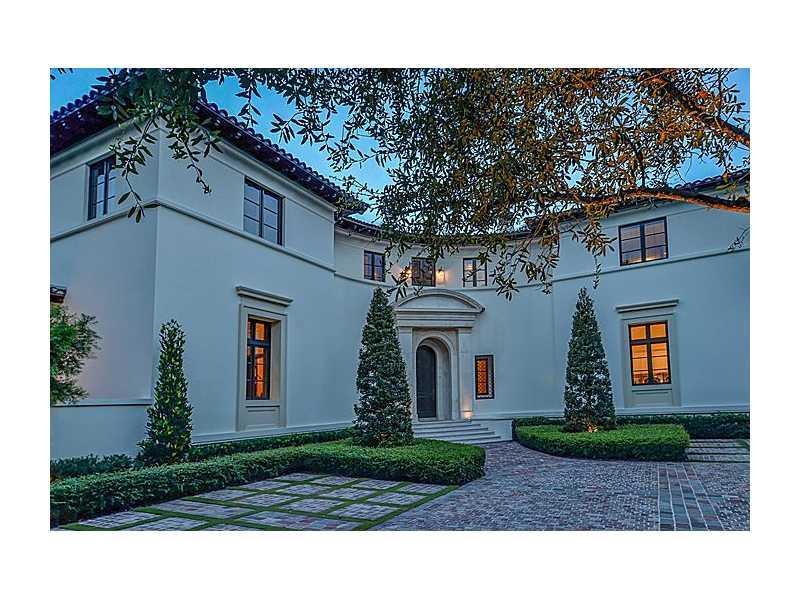 Luxury & elegance describe every detail of this magnificent Italian Farm-inspired estate designed by  Portuondo-Perotti Architects. Located in the prestigious Ponce Davis neighborhood, this unique secluded property features a gorgeous gourmet kitchen, a g rand room with 24ft high coffered ceilings, large master bed suite with breakfast bar, hand scraped walnut floors, 6 car garage & a spectacular garden designed by Landscape architect Robert Parsley. This Smart House is equipped w/ Creston system.
