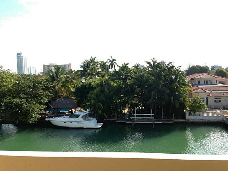 THIS APARTMENT HAS IT ALL :  REMODELED 1 BED, BALCONY, ASSIGNED SECURED PARKING, SWIMMING POOL, VIEW ON THE CANAL AND ALL MID-BEACH. ONE BLOCK FROM 41 STREET SHOPPING AND TRANSPORTATION IN MIAMI BEACH. VERY QUIET, READY TO MOVE-IN.  THIS IS RARE, WON T LA ST.  No Pets Allowed.