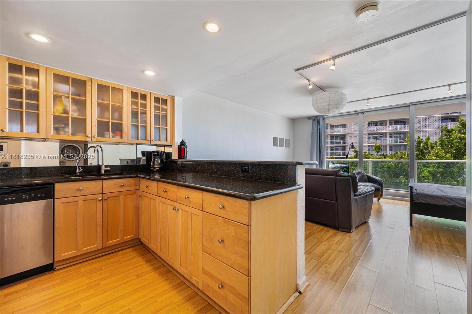 Welcome to this beautifully renovated, fully furnished studio at Mirador 1000. This thoughtfully designed unit features wood flooring throughout, a balcony with hurricane-impact doors, serene bay views, in-unit washer/dryer, and ample closet space. Enjoy a spacious, fully equipped kitchen complete with granite countertops, stainless steel appliances including a dishwasher and microwave, and wood cabinetry. Building amenities include 24-hour lobby concierge, security, valet service, a heated pool, hot tub, and an on-site convenience store. Ideally located on vibrant West Avenue, just steps from Whole Foods, Flamingo Park, Lincoln Road, Trader Joe’s, and offering easy access to Miami Beach causeways. Rent includes basic cable, internet, and water. Valet parking available for additional fee.