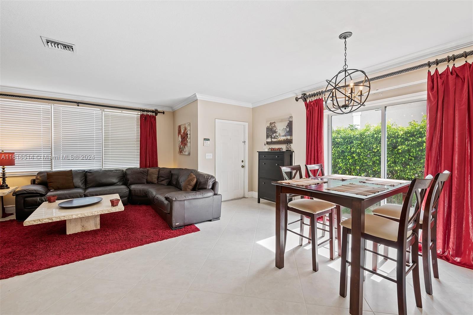 Welcome to 10584 NW 57th Court in desirable Main Street @ Cinnamon Crossings. This 3 Bedroom
2.5 Bathroom home is situated on a corner lot across from the community pool. This open concept floor-plan
features a large family room, dining room area, large kitchen with island and an additional living room which can
be used as a flex space. This home was just recently updated with all brand new lighting fixtures and has a two car
garage. Close to sawgrass express way, community parks, shopping, and entertainment.