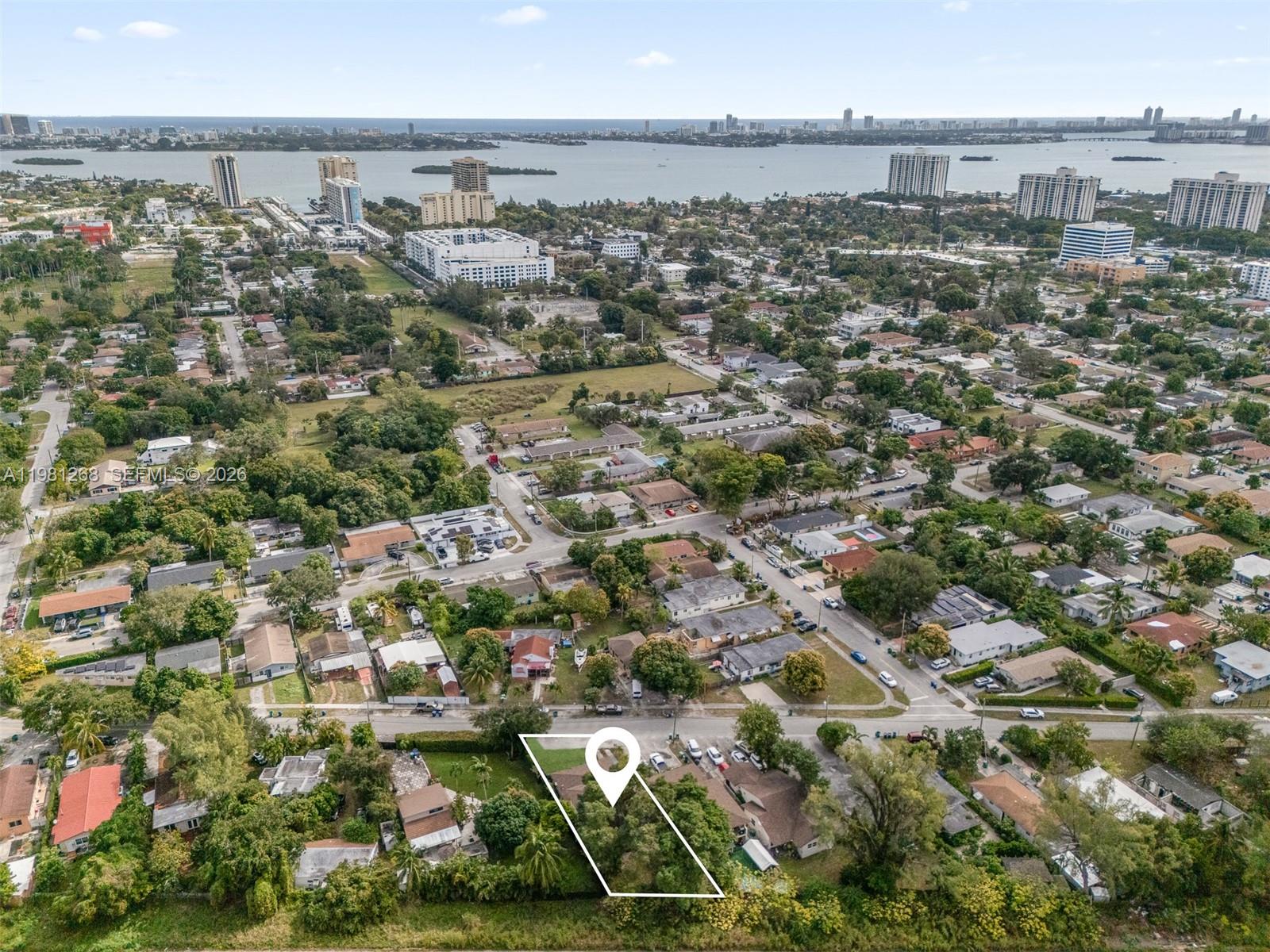 Prime Investment Opportunity in North Miami! This income producing triplex is a standout! Ideally located right between Miami Shores and Biscayne Park , in a high growth area with significant city investment planned over the next few years. The property features a 2021 roof, updated kitchens and bathrooms, durable vinyl flooring, and modern appliances. Currently rented to long term tenants, this property delivers a strong cap rate. Don’t miss this chance to capitalize on North Miami’s growth potential!