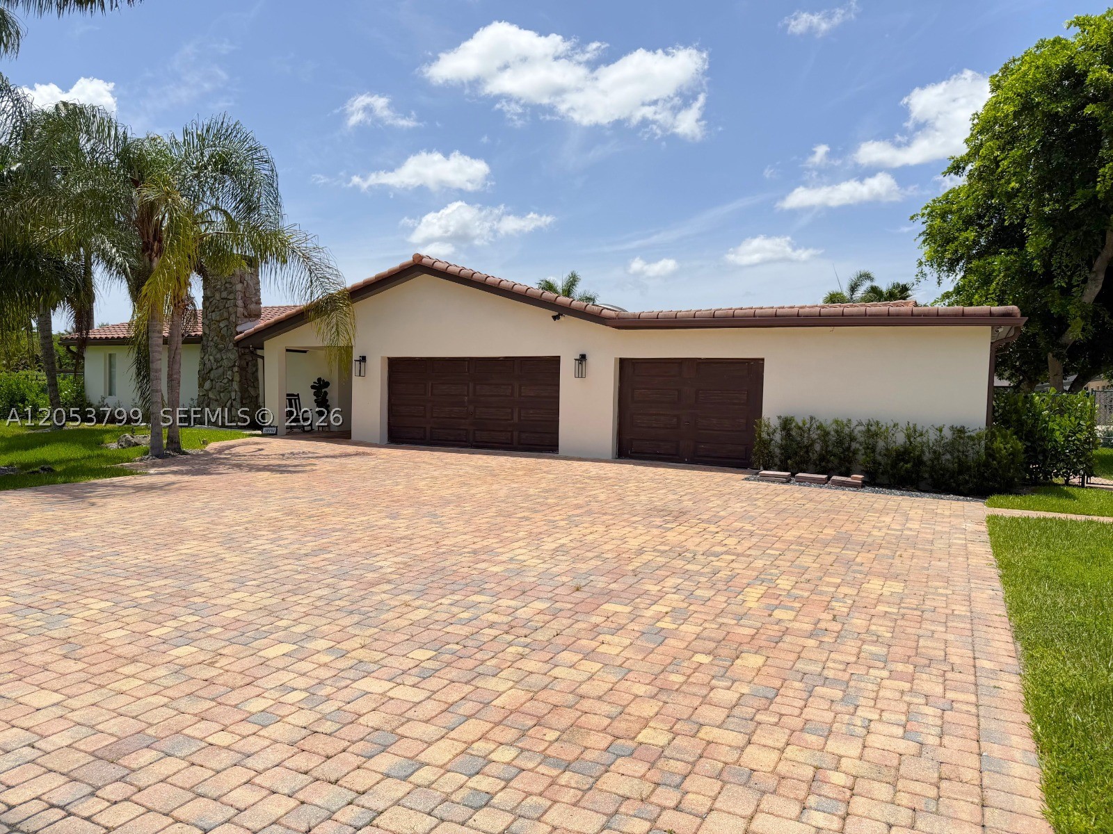 Rare opportunity to lease this 4-bedroom, 3-bath single-family home with 2 garages, situated on a sprawling 42,452 sq. ft. lot in a private community in the heart of Davie, bordering prestigious Southwest Ranches. Located in one of South Florida's premier equestrian areas, this home offers privacy, space, and a peaceful lifestyle. Bright, open living areas flow into a beautifully brand new kitchen with ample cabinetry and counter space. The generous primary suite features a walk-in closet and remodeled en-suite bath. Enjoy your own private backyard oasis with a sparkling pool, lush landscaping, and nearly an acre of green space—perfect for entertaining, relaxing, or outdoor activities.  Plenty of room for RV or boat parking and Conveniently located near top-rated schools, shopping, dining, parks, and major highways. Experience estate-style living with the convenience of city amenities just minutes away. Pets considered with landlord approval.  Pool and lawn maintenance are not included. Available for immediate occupancy. Schedule your private showing today!