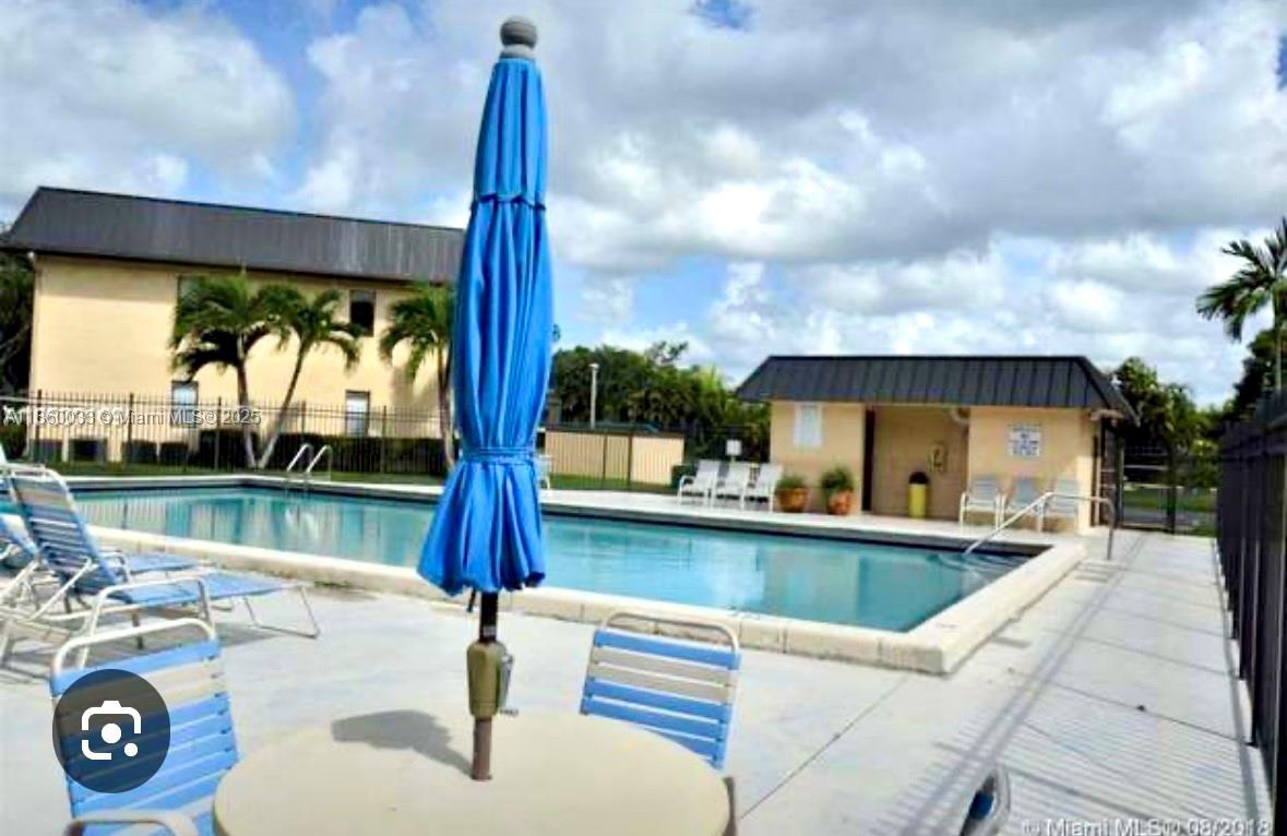 Nice 2/2 in the heart of Pembroke Pines overlooking the lake!
1st floor unit, beautiful community with large pool, BBQ area, Tennis courts, Lakeside walkways and Bicycle storage area. 
Pets allowed. Walking areas, trees, parks in a residential area. Close to Pembroke Pines Mall , restaurants, malls and schools. Quiet, Comfortable community next to Tanglewood Park. Priced to sell. Low HOA. Association has full reserves, 5 year old roof.
Long term tenant paying 2,200 per month.