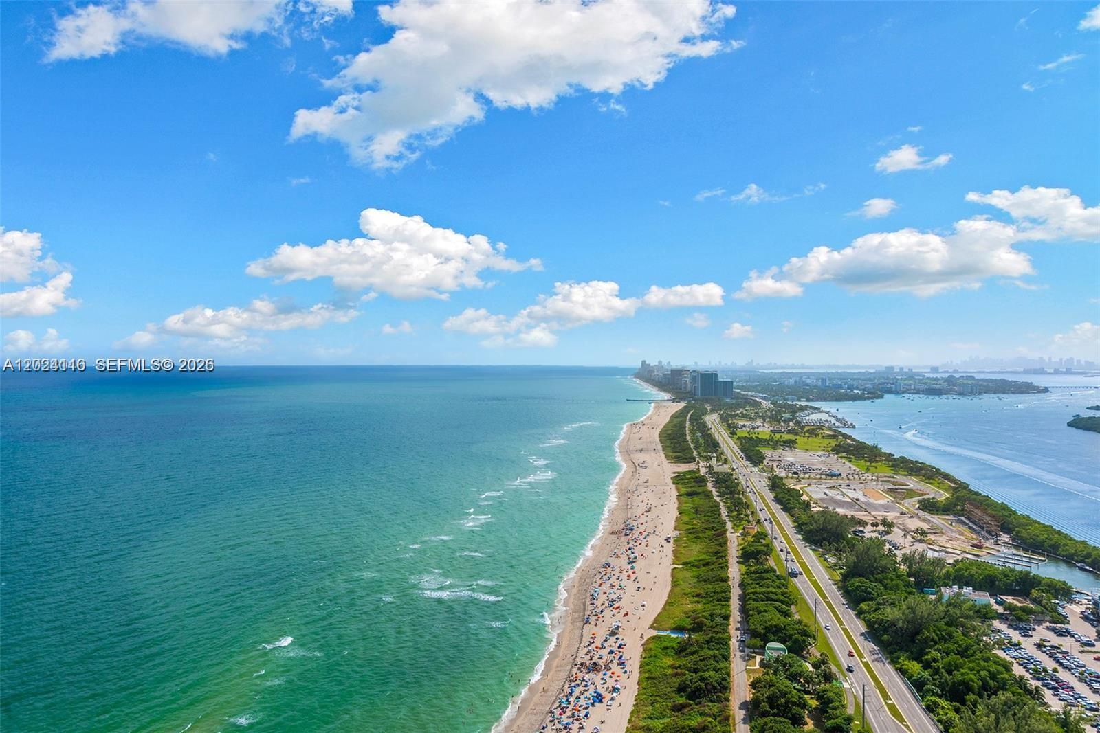Simply the most incredible view in Miami. With an open, flowing and generous floorplan, boasting a fabulous great room, kitchen, dining and 4 bedrooms, there is no compromise between form and function. Encompassed in complete floor to ceiling walls of glass throughout, you are on the precipice of where ocean, sand, city and sky meet. Ritz Carlton Residences is the epitome of luxury and elegance, replete with 5-star amenities. Positioned directly on the 177-acre Haulover Park, the building becomes a tranquil oasis just minutes from Bal Harbour and the glamour and pizazz of Miami Beach. With two pools, full beach services, restaurant, gym and spa; each day is like living on vacation. Add the 33rd fl. owners lounge and guest rooms, to happy hour at sunset, and the experience becomes complete.
