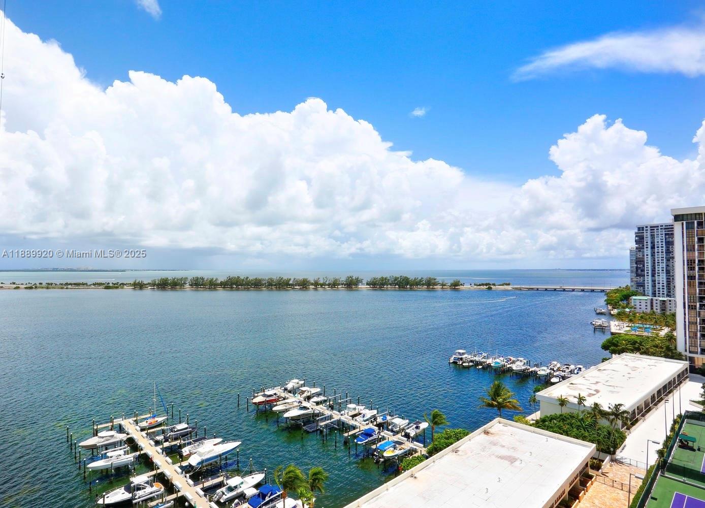 This beautifully renovated residence showcases serene Biscayne Bay views and natural light through floor-to-ceiling windows. Recent upgrades include new ceilings, lighting, floors, and a custom kitchen with stainless steel appliances, ample storage, and a center island with seating, ideal for entertaining. The primary suite offers water views, custom closets, and a spa-like bath with elegant finishes. Washer and dryer in unit. Building amenities include tennis courts, gym, and 24-hour security, all in a prime location.
