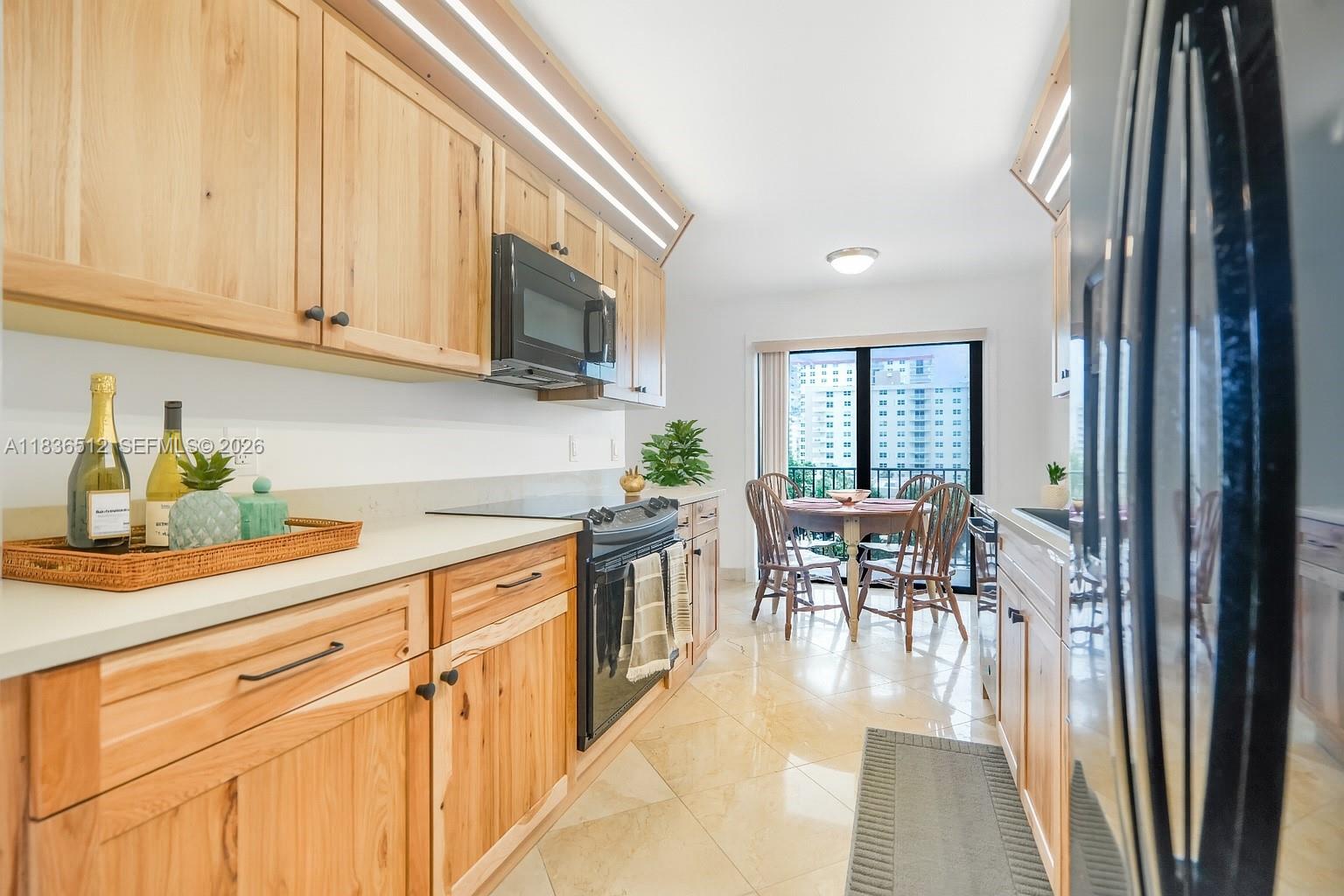 WOW WOW WOW Spacious 2BR/2BA condo with 1,560 sq. ft. on the 4th floor of The Summit, South exposure, perfectly located at the entrance of Hollywood’s Broadwalk. This bright unit offers abundant natural light, a split floor plan with two private en-suite bedrooms, an updated kitchen with hickory cabinets and quartzite countertops, a brand-new modern Bathroom with a modern shower and glass doors, and a new electrical panel. Features include marble flooring, smooth ceilings (no popcorn), impact windows and doors, LED lighting, in-unit washer/dryer, and deeded garage parking. Enjoy a large covered balcony with beautiful Intracoastal views and partial ocean views. The Summit offers 24/7 security, two heated pools, an on-site restaurant, a gym, tennis, pickleball, and well-maintained beachfront grounds. Minutes to FLL Airport, restaurants, shopping, and downtown Hollywood. Move-in ready and easy to show.