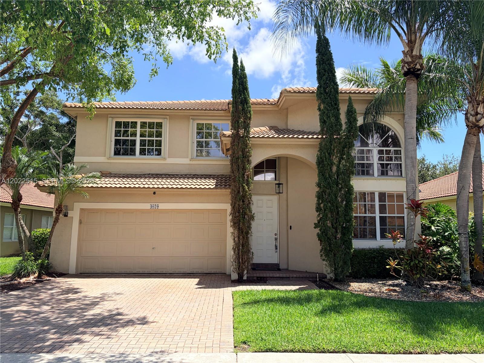 Welcome to 4020 Sapphire Cove, nestled in the prestigious gated community of Emerald Estates in Weston. This beautifully updated home impresses from the moment you walk in, with gleaming ceramic floors, designer light fixtures, and a bright open layout that flows effortlessly throughout. The renovated kitchen features modern finishes perfect for everyday living and entertaining. One updated bathroom. Step outside to your private backyard with a generous patio. New A/C 3 years old and water heater Changed last year. Residents enjoy 24/7 guard-gated security, a community pool, fitness center, playground, and HOA-included cable & internet. Zoned for Weston's top-rated A+ schools including Everglades Elementary, Falcon Cove Middle, and Cypress Bay High. Minutes from I-75, shopping, and dining. This one truly has it all  schedule your showing today!