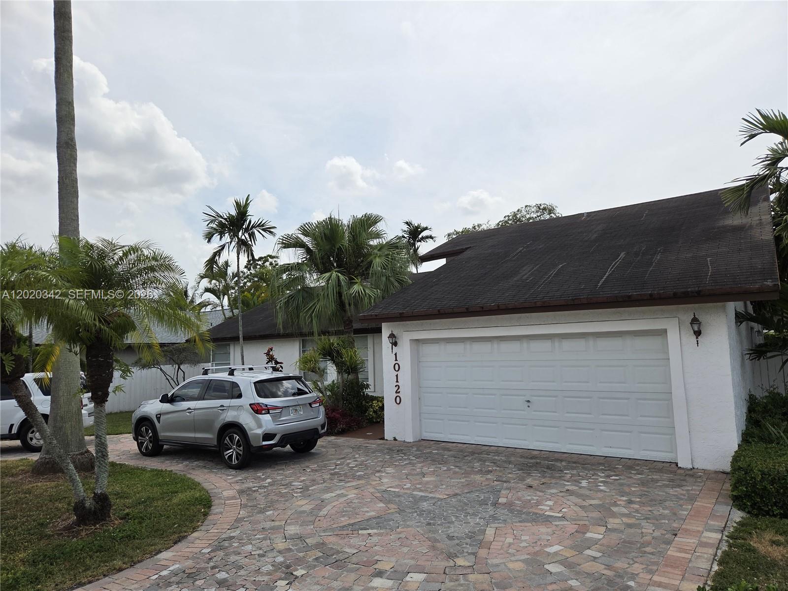 Centrally located in a highly desirable Miami neighborhood, this ideal 4-bedroom, 2-bathroom, one-story home offers 2,493 sq. ft. of beautifully designed living space on a generous 7,500 sq. ft. lot. The residence features tile flooring throughout, a bright and ample formal living and dining area, and a fully equipped kitchen that opens directly to a spacious family room - perfect for entertaining. Enjoy the privacy of a fully fenced backyard patio and the convenience of a 2-car garage. Situated in an excellent, top-rated school district. This move-in-ready home is an exceptional opportunity.