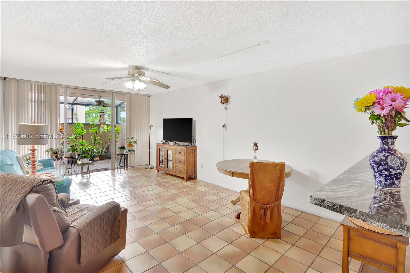 FIRST FLOOR UNIT 2BD/2BA t in the desirable Gardens of Kendall! This spacious unit features an updated kitchen, newer A/C and water heater, and a private PATIO perfect for relaxing. Financing friendly  building with full reserves, 40-year certification COMPLETED and NO ASSESTMENTS . Enjoy resort-style amenities including pool, tennis courts, clubhouse, and on-site laundry. Prime Kendall location directly across from Miami Dade College, with quick access to major highways, shopping, dining, and public transportation.