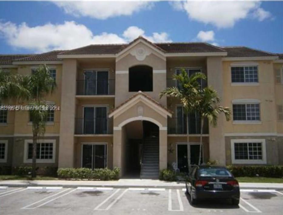GREAT INVESTMENT PROPERTY Opportunity in VISTA TRACE , 2 bedrooms and 2 bathrooms Unit, with an excellent location in a gated secure community, this unit has all Ceramic Tiles throughout in all areas, spacious open Kitchen, washer and dryer, microwave, refrigerator, range, dishwasher, balcony, beautiful clubhouse, fitness room , etc . Close to Schools, shopping mall, and 30 minutes drive to KEY LARGO, Quick access to Turnpike and US1, Don't miss this opportunity!!! The unit is rented $1925 per month until december 2026