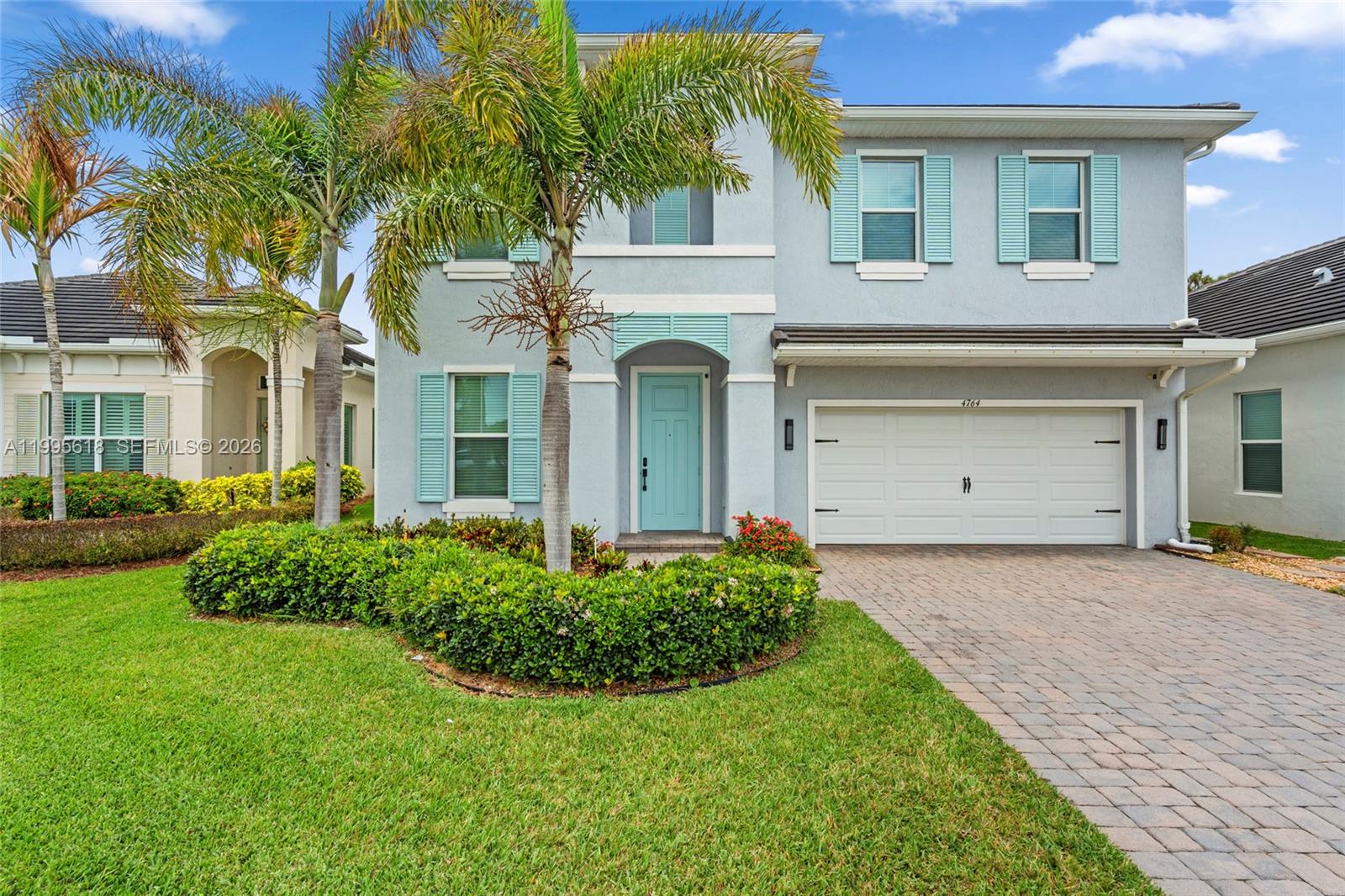 Beautifully maintained two-story home offering the perfect blend of space, style, and outdoor living in desirable Stuart! This light-filled residence features a spacious open-concept layout with soaring ceilings and a grand living area that creates an impressive first impression. The modern kitchen is a true centerpiece, showcasing an oversized quartz island, stainless steel appliances, double wall ovens, and abundant cabinetry—ideal for entertaining and everyday living.
The primary suite offers a relaxing retreat with a large spa-like bathroom featuring a soaking tub, separate glass-enclosed shower, and generous walk-in closet with custom built-ins. Additional bedrooms are well-sized, providing flexibility for family, guests, or a home office.
Step outside to enjoy a covered and screened lanai overlooking a private backyard oasis with lush landscaping, mature palms, and plenty of room to add a pool. The extended patio area is perfect for outdoor dining and entertaining year-round.
Additional highlights include a 2-car garage, dedicated laundry area, ample storage, and a beautifully designed interior with neutral finishes throughout. Conveniently located near top-rated schools, shopping, dining, and major highways.
Move-in ready and packed with upgrades—this is South Florida living at its best!