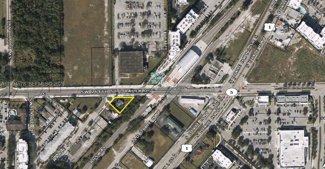 Prime redevelopment opportunity in Miami-Dade County. This vacant 0.23-acre lot is located within the Urban Center (UC) Core – Mixed Use Corridor (MC) zoning district, allowing for mixed-use development up to 6 stories. This flexible zoning supports a variety of residential, commercial, and mixed-use configurations, making it an excellent site for builders, investors, or developers seeking to capitalize on the area’s ongoing growth.

Positioned along SW 264th Street in the Naranja/Princeton corridor, the property benefits from proximity to major transit routes, retail centers, schools, and community services. The surrounding area continues to experience strong redevelopment activity, supported by Miami-Dade’s long-term urban planning and density initiatives.

Whether you’re exploring multifamily, workforce housing, commercial frontage, or a mixed-use concept, this parcel offers exceptional potential in a rapidly expanding market. No HOA.
A rare opportunity to secure a development-ready lot in one of South Miami-Dade’s most active growth zones.

Buyer is responsible for verifying access options, easements, intended use, and any future development possibilities, etc. with Miami-Dade County and/Homestead Planning and Zoning. Parcel is being sold as-is.