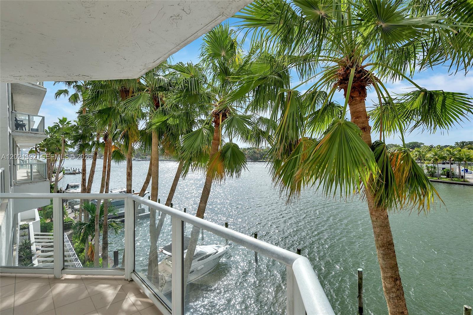 Beach Living at Its Best! Large Corner Unit 3 Bed/2 Bath with 1,390 Sq Ft and Breathtaking Intracoastal & City Views Facing East, North & West — Enjoy Spectacular Sunrises and Sunsets from 3 Wraparound Balconies. Private Coded Elevator Opens to Your Own Foyer. Bright and Spacious Layout with Abundant Natural Light and Floor-To-Ceiling Windows. Marble & Bamboo Flooring Throughout. Second Bathroom Features a New Shower. Open Kitchen with Granite Countertops and Window Facing the Water. New Stove & Dishwasher. Large Dining Area and Spacious Living Room Perfect for Entertaining. Primary Suite Features Large Walk-In Closets, Double Sinks, and Whirlpool Tub. Washer & Dryer inside the Unit. Full-Service Amenity Building Offering 24/7 Security, Gym, Pool, Rooftop Deck on the 18Th Floor, Jacuzzi, Sauna, Valet, and Beach Access Directly across the Street.
Located on Famous Millionaire's Row across from the Ocean.