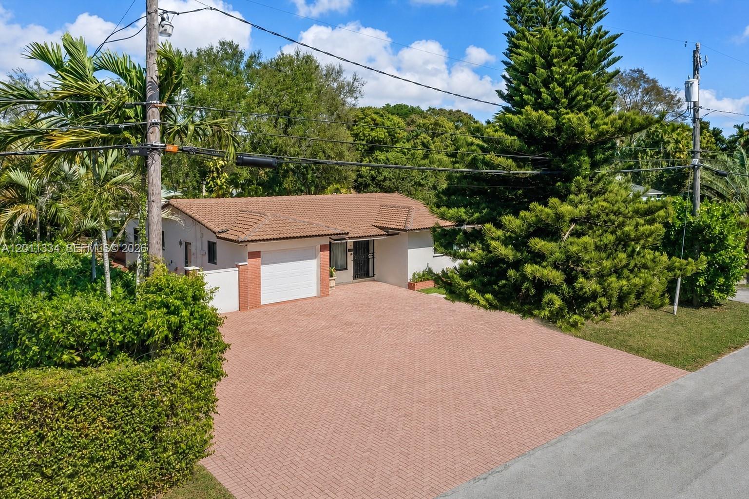 PRICED TO SELL!!! Don’t miss this opportunity in Schenley Park! This 3-bedroom, 2-bath home includes a versatile flex room that can serve as an extra bedroom or den. The home features a generous Florida room perfect for hosting or relaxing. The large lot provides excellent potential for a pool or expanded outdoor living. Recent improvements include: brand-new roof, impact windows, freshly painted exterior, and landscaping throughout. With a one car garage and ample driveway parking, convenience is built in. Just blocks from Coral Gables, you’re in one of Miami’s most desirable neighborhoods. Seller is extremely motivated—bring all offers!
