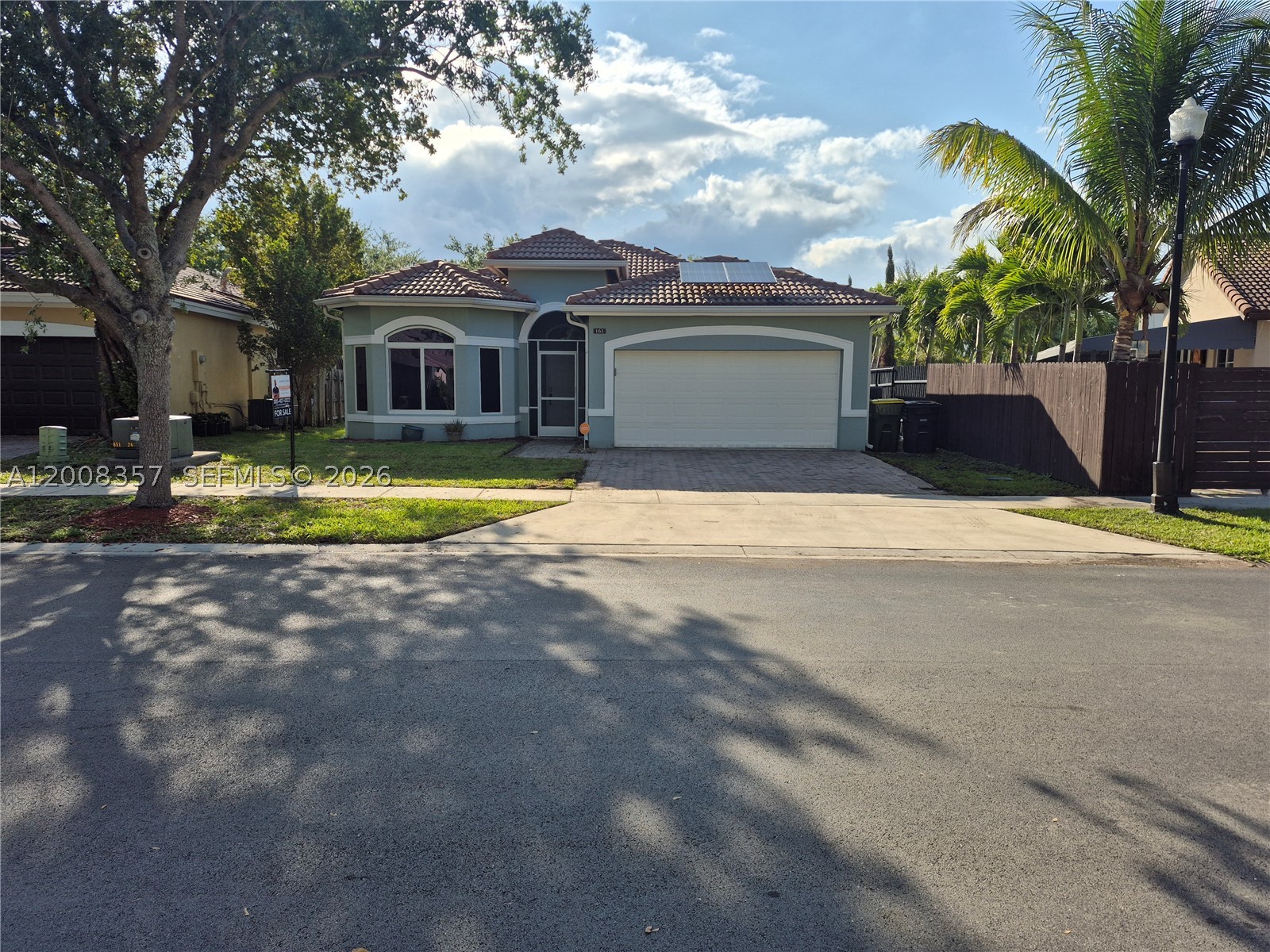 Welcome to this 3/2 home in the exclusive gated community of Isles of Oasis, Ventanas del Sol. Designed for comfort and sustainability, it offers full impact windows, solar panels, and Tesla batteries—all paid off. this means, no electrical bill. The open layout, 2-car garage, and peaceful setting with no back neighbor create the perfect blend of privacy and comfort. A truly rare find in one of Homestead’s most desirable neighborhoods.