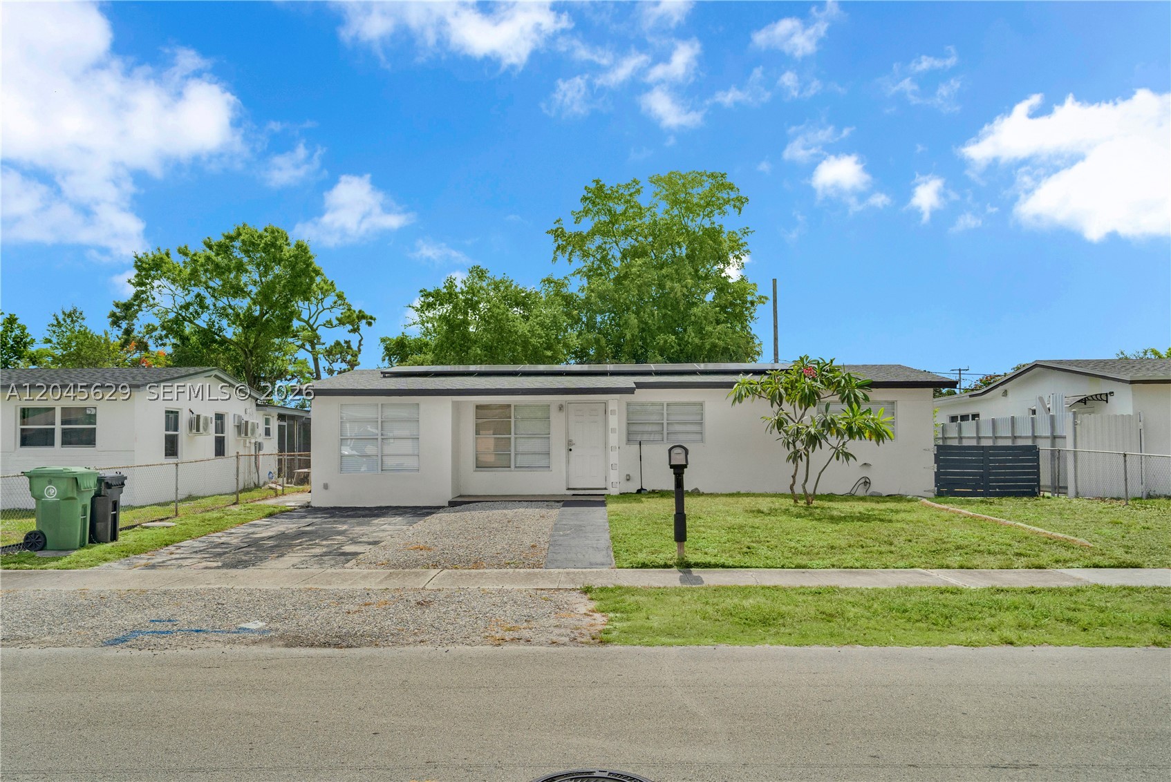 Fully renovated 4-bedroom, 2-bathroom home located in a quiet Fort Lauderdale neighborhood! This beautiful residence features a desirable split floor plan, offering both comfort and privacy. Situated on an oversized lot, the property boasts a huge backyard with endless possibilities for entertaining, outdoor living, or adding a pool. Additional highlights include a newer roof, replaced in 2022, and energy-efficient solar panels for added savings. This move-in-ready home combines modern updates with exceptional outdoor space—don't miss this must-see opportunity!