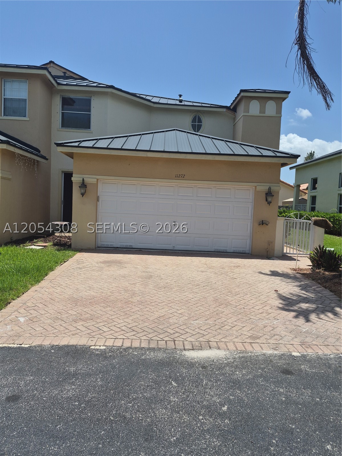 Beautiful and spacious townhouse in Las Cascadas at Doral. 3 bedrooms, 3 bath, family, formal dining room, living room, 2 car garage, driveway for 2 additional cars, nice patio. High ceiling, first floor Wood, second level and stairs carpeting. Community pool. Gated, controlled access.