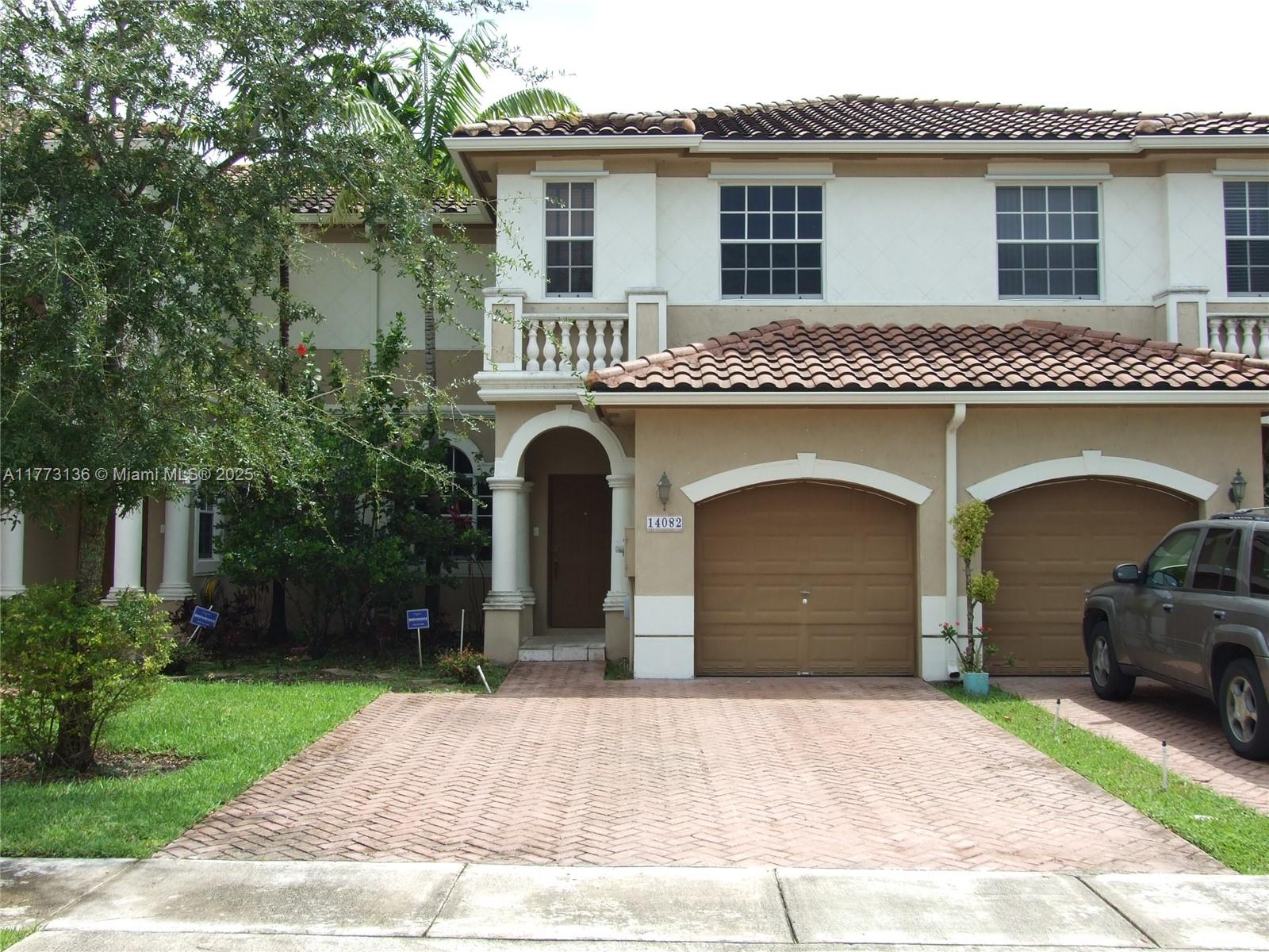 Motivated seller; reduced for quick sale! Tenant occupied through Jan/2027.Beautiful Escada townhome 3/2/.5 unit with garage and 1,700 sf facing clubhouse and pool. Ample kitchen with adjacent laundry room with full-sized washer/dryer. Ceramic tiles throughout ground level with real hardwood on 2nd level. Freshly painted inside. Nicely fenced yard. Attached single car garage with room for two more on driveway. Shows beautifully with ample, functional floor plan. Hurricane shutters included. Pets permitted. Two manned security gates to the development. Exceptional location with quick access to expressways, dining and shopping. Will not disappoint.