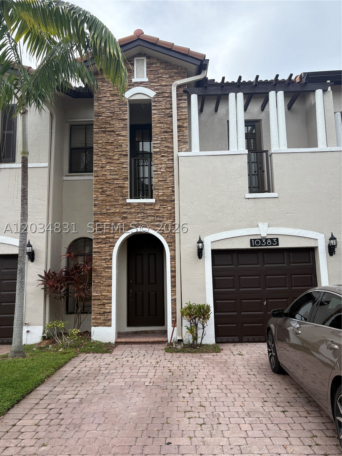 Beautiful and spacious 3 bedroom 2 1/2 bath home. Large bedrooms and closets. Paved backyard. Garage has been converted to 4th bedroom can be used as an office or playroom.  2 car drive way space for a 3rd car in a guarded and safe community Milan. Community had a gym and pool and a guarded entry. Close to everything in the center of Doral.
