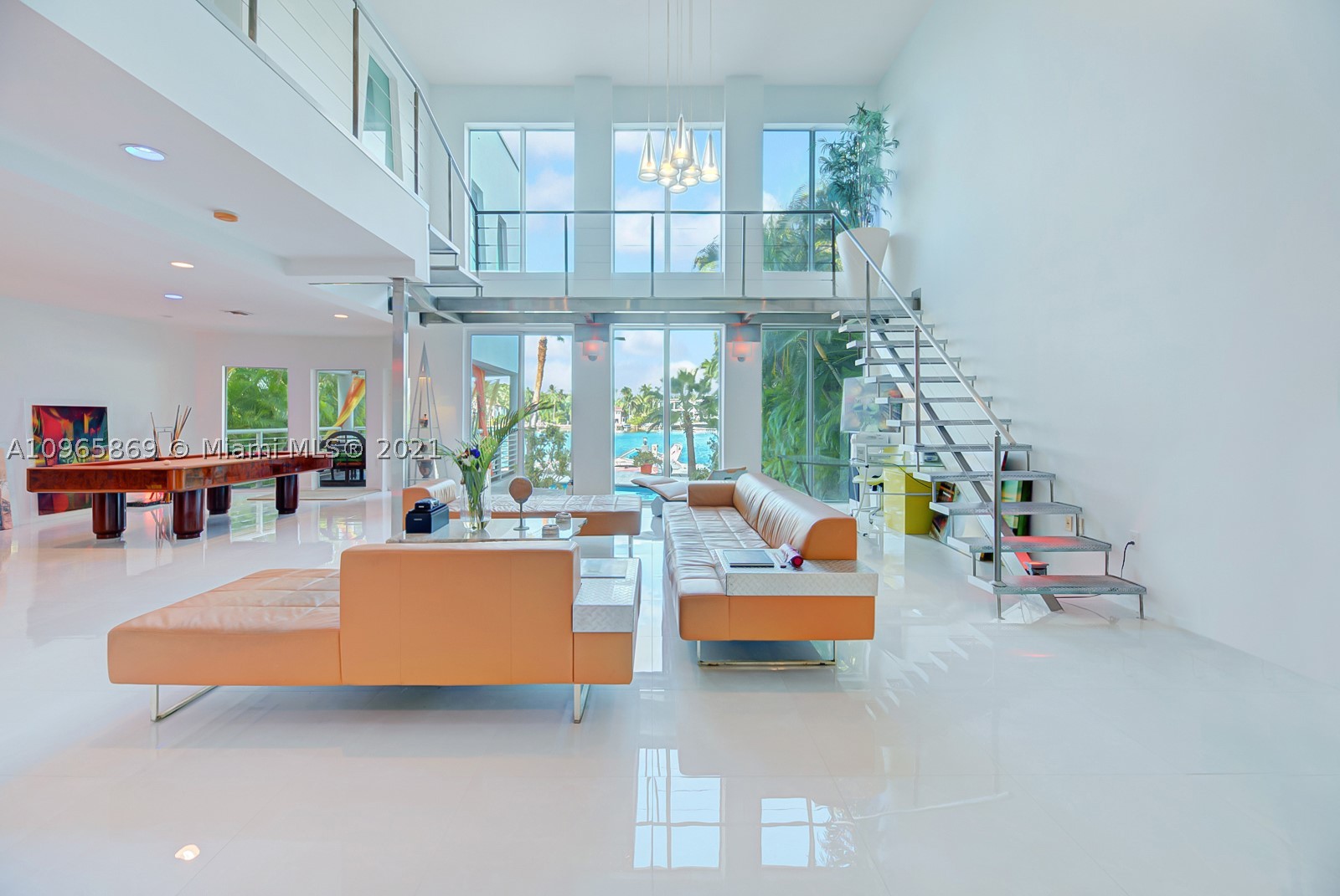 Welcome to the prestigious Palm Island Waterfront Paradise! This beautiful home was designed and built by the owner himself in 2002 to fit his every need imaginable. The home was customized and features a Chef's Kitchen, 20 foot ceilings, oversized grandeur impact windows showcasing the water views. 50 Ft Water Frontage for the yacht, Over Sized Pool, Outdoor covered deck, 4 Bedrooms 4.5 Bathrooms, Over 4,100 Sqft Living Space, Open Loft Theater Space, 1 Car Garage, 7,000 Sqft Lot able to park 4 Cars, Privately Gated, Extravagant Lighting System indoor and outdoor. Easy access to Miami Downtown nightlife and South Beach clubs, restaurants and everyday beach life!