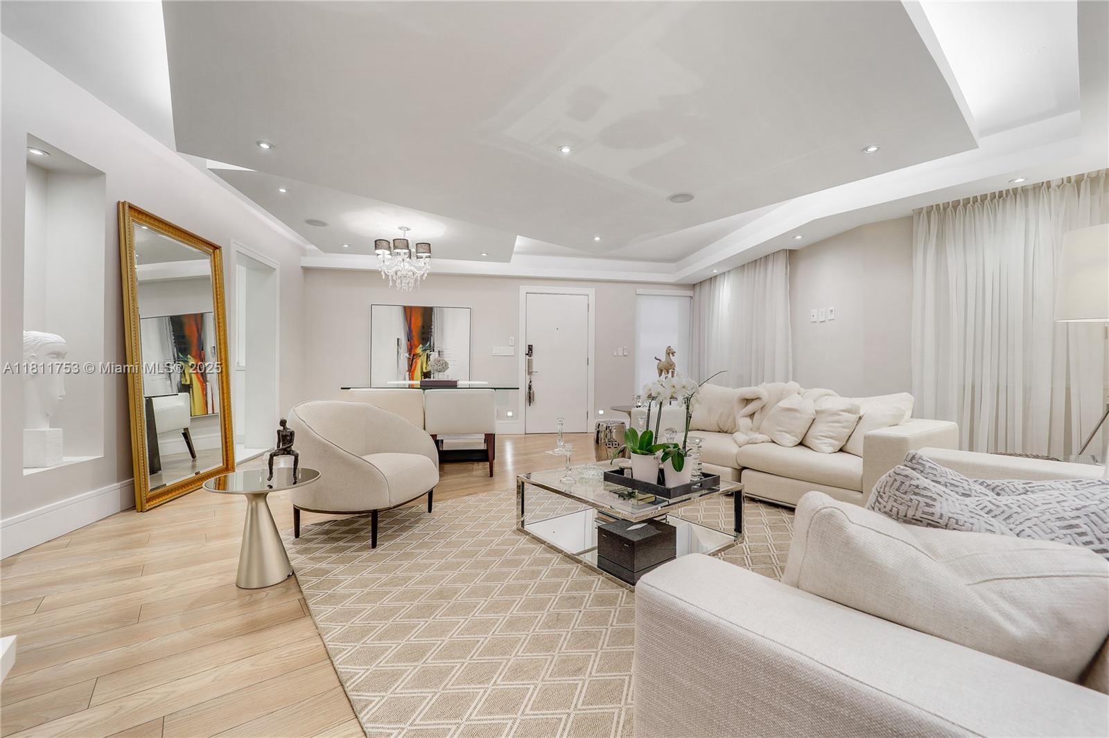 Experience refined coastal living in this beautifully designed 2-bedroom residence, just steps from private beach access in exclusive Bal Harbour. Tucked inside a boutique building, this home offers a rare blend of privacy and elegance. Curated by a renowned designer, it features ambient cove lighting, a central sound system, and serene green views. With in-unit washer/dryer, bike storage, and a layout that feels more like a private home than a condo, it’s truly one of a kind.