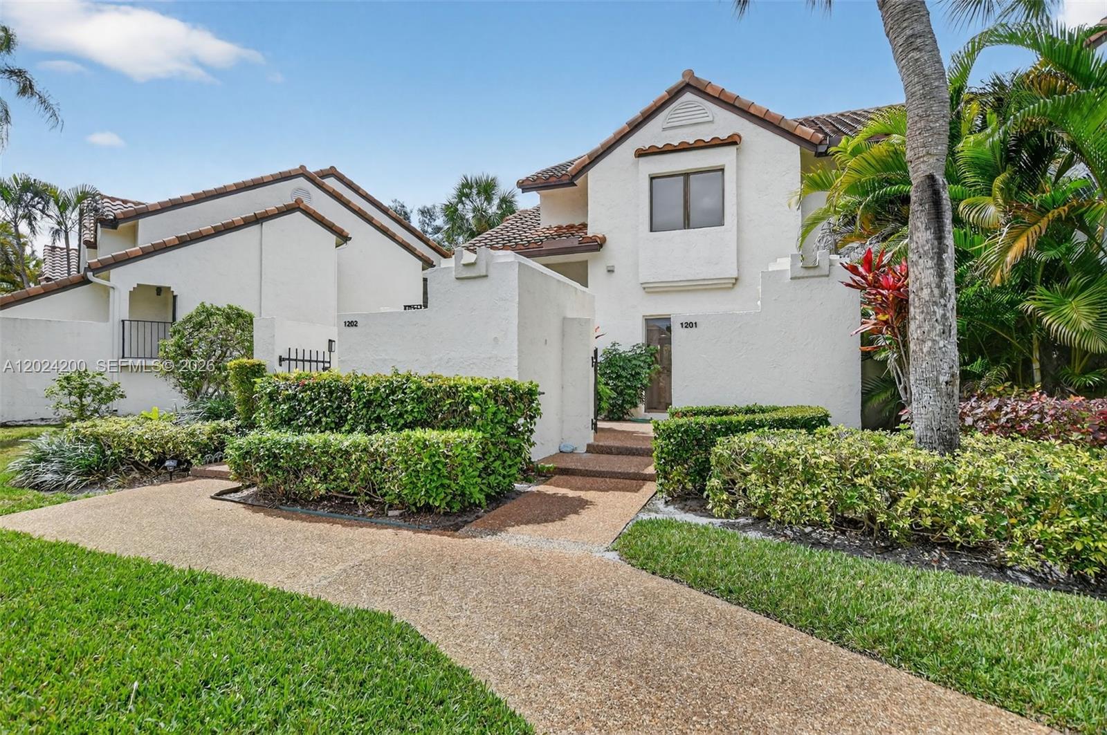 Highly sought after end unit in El Viento at Boca Pointe, beautiful 2 BR, 2 BA FIRST FLOOR 1309 sq ft garden apartment with open floor plan and abundance of natural light, spacious primary suite with custom walk-in closet and beautiful updated bathroom, glass enclosed patio with golf course view, impact windows, custom window treatments, gated community with 24 hr security, ideally situated just steps from heated community pool/hot tub, community walking and bicycle paths, 1 covered carport spot, rent includes water, cable and internet, conveniently located near top-rated Boca Raton schools, shopping, dining, and nightlife in Boca and Delray, short drive to local beaches, Town Center Mall, Mizner Park and Delray's Atlantic Avenue and major highways (I-95 and Turnpike).