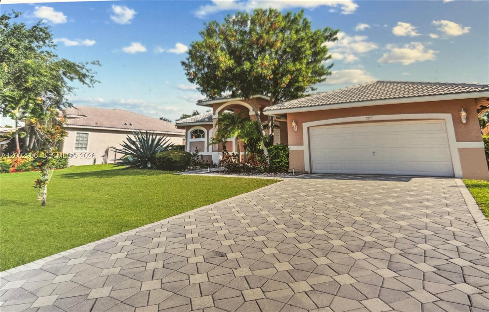Welcome to this stunning property located in Coral Springs. This home features a spacious layout with ample natural light throughout. The modern kitchen is equipped with high-end appliances and plenty of cabinet space. The bedrooms are generously sized, providing comfort and privacy. Enjoy outdoor living with a beautifully landscaped yard and a refreshing pool. Conveniently situated near local amenities, this property both luxury and convenience. Don't miss the chance to make this your dream home!