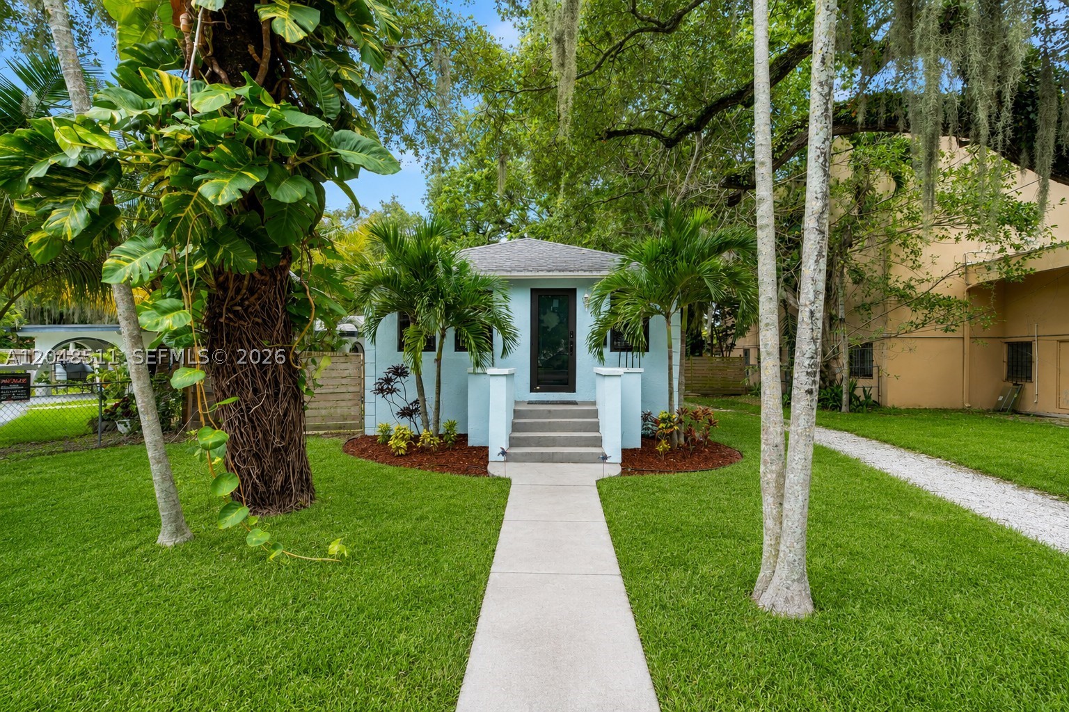 Nestled in the heart of North Miami Beach, this beautiful 2-bedroom, 1-bathroom single-family home offers the perfect blend of charm, comfort, and opportunity. The bright open-concept layout features an updated kitchen with granite countertops, stainless steel appliances, and spacious living and dining areas filled with natural light. Recent improvements include new impact windows and doors installed in 2025 and a whole-house water filtration system, providing added value, efficiency, and peace of mind. Situated on an oversized lot, the property provides endless possibilities to expand, add a pool, create an outdoor oasis, or build your dream home. Enjoy the expansive backyard with a large concrete patio, mature tropical landscaping, and plenty of room for entertaining or future additions. Whether you're a homeowner, investor, or builder, this property offers exceptional value and potential. Ideally located just minutes from Aventura Mall, Sunny Isles Beach, Oleta River State Park, Bal Harbour Shops, top-rated dining, shopping, and entertainment. Convenient access to I-95 and major highways makes commuting a breeze. Located in one of South Florida's fastest-growing areas with strong rental demand, this is an outstanding opportunity to own a piece of paradise with unlimited potential. Don't miss this rare oversized-lot opportunity in an unbeatable location!