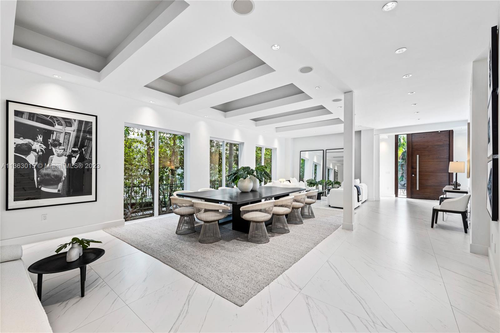 Stunning turnkey waterfront renovation by Artek Design Corp in the one and only Golden Beach. This spectacular 5 bedroom 6 bathroom contemporary palace has been increased in size to approximately 6500 sq ft under A/C with a brand new master suite (bedroom, sitting area, oversized bathroom and closet). Invite family and friends over to enjoy the newly renovated kitchen and dining spaces or to watch movies in your custom movie theater. Take meetings in your home office or enjoy a cup of coffee on one of the terraces overlooking the water in the back or your private park in the front. Unique location on South Parkway, across from one of the neighborhood's green parks and walking distance to the neighborhood's private beach, tennis courts, and recreational parks. This is the Golden Beach dream