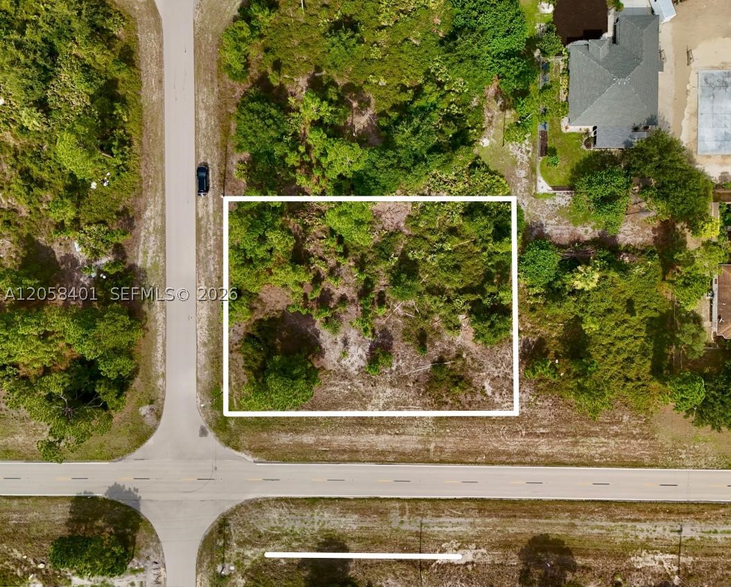 Build your dream home on this 0.33-acre residential vacant lot located in Lehigh Acres, FL 33974 (PID: 25-45-27-L3-15084-0010). This oversized parcel offers plenty of space for your custom home while enjoying the privacy and tranquility of a growing neighborhood. Conveniently located with easy access to SR 82, this property provides a straightforward commute to Fort Myers, Southwest Florida International Airport, shopping, dining, schools, parks, golf courses, and everyday conveniences. Whether you're looking to build now or invest for the future, this is an excellent opportunity in one of Southwest Florida's expanding communities. Electricity is available in the area. Well water and septic system are required, as public water and public sewer are not available at this property.