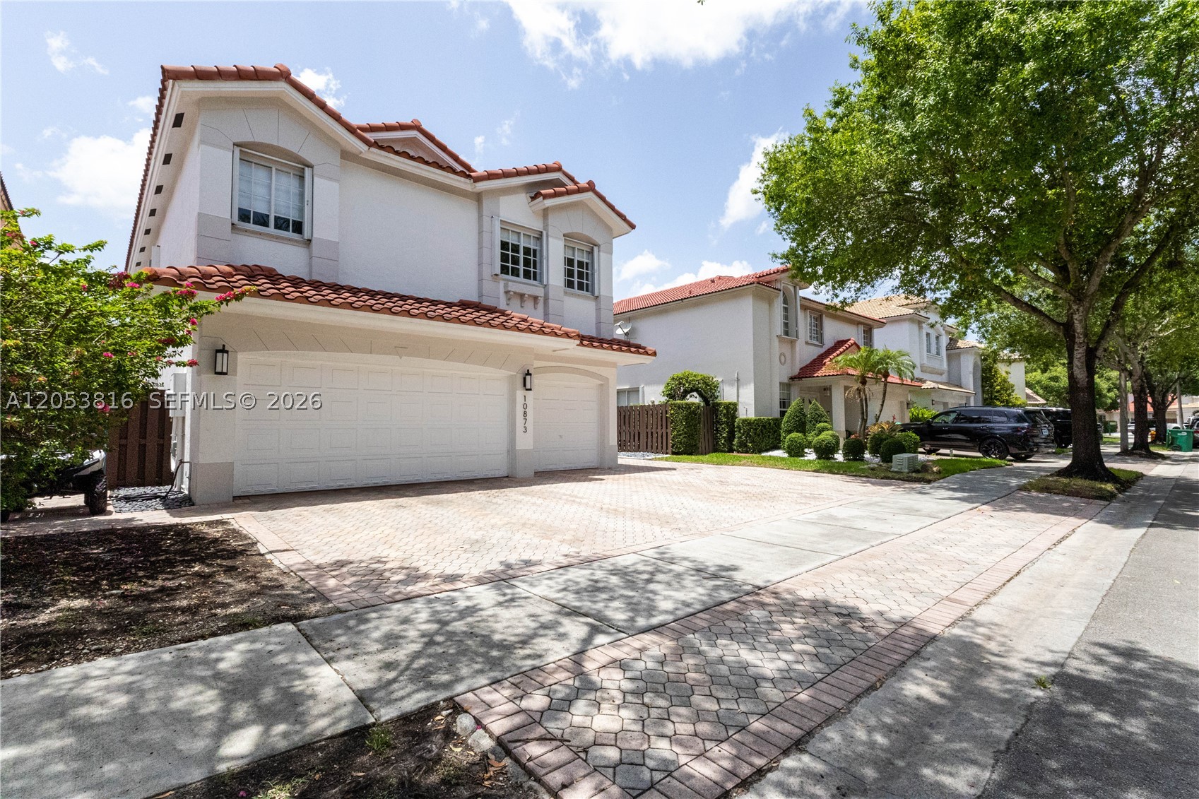 Welcome to this impressive 5-bedroom, 3-bathroom home located in the highly sought-after gated community of Doral Isles–Croix! This spacious residence offers the perfect combination of comfort, style, and resort-style living. The property features ample parking for 6+ vehicles, including a 3-car garage—ideal for large families and entertaining guests. Step outside to a spacious backyard, perfect for family gatherings, celebrations, and creating your own private outdoor retreat. Inside, enjoy modern touches throughout, including an updated kitchen with modern appliances. The oversized primary suite features a spacious walk-in closet and plenty of room to relax. Additional highlights include a roof approximately 5 years old or newer, a freshly painted exterior, and partial remodeling. Residents enjoy access to a state-of-the-art clubhouse with spectacular pools, a fitness center, cabanas, tennis and basketball courts, soccer fields, and more—all within a gated community with 24/7 security patrol. Don’t miss the opportunity to own a beautiful home in one of Doral’s most desirable communities. Schedule your private showing today!¡