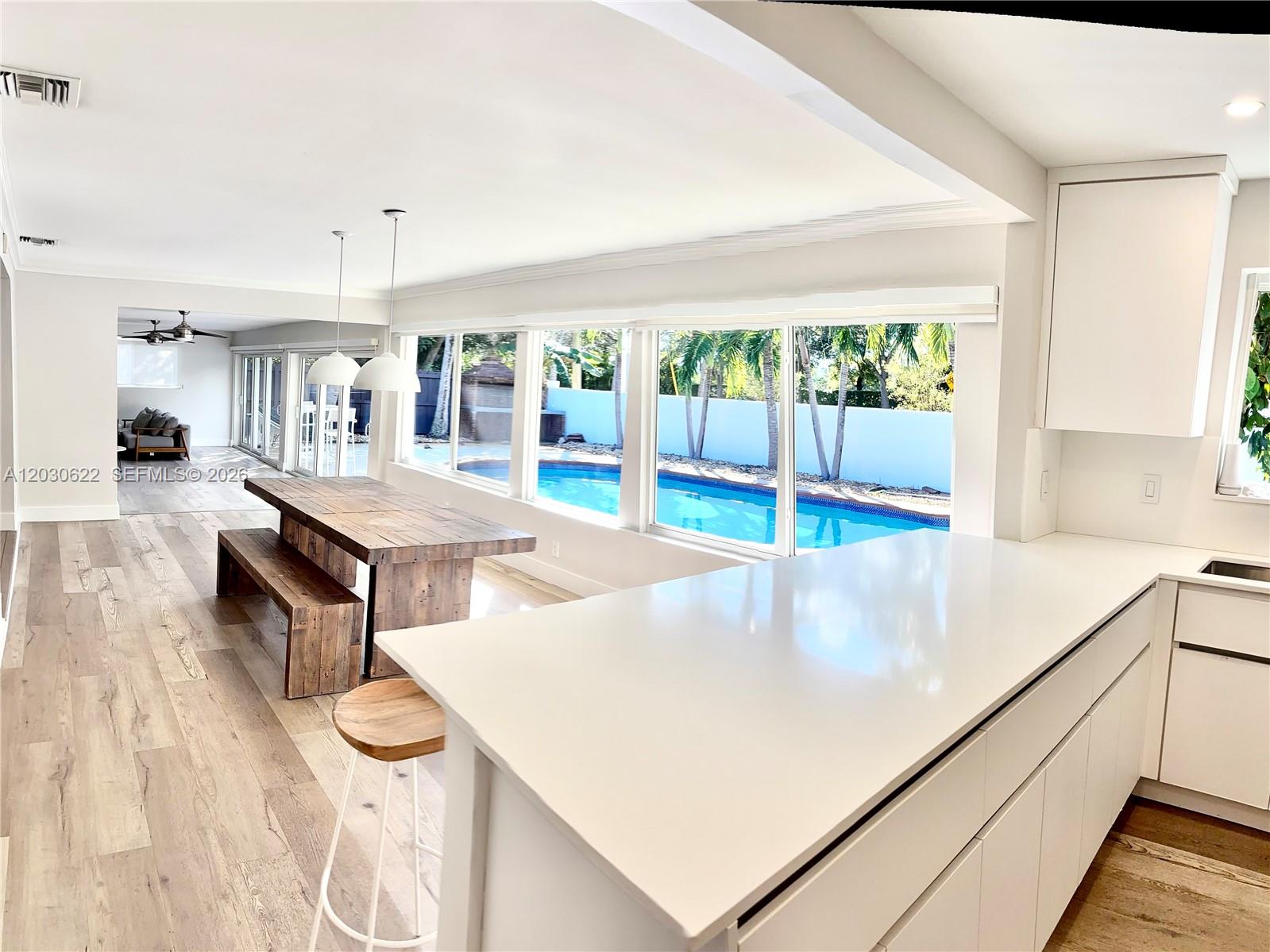 SPACIOUS POOL HOME FEATURING 3 BEDROOMS+LARGE PRIVATE OFFICE/FLEX ROOM, 3 FULL BATHROOMS, APPROX (AS PER THE OWNER)  2,600 SF OF AIR-CONDITIONED LIVING SPACE. THIS EXCEPTIONAL RESIDENCE WITH HURRICANE-IMPACT WINDOWS AND SLIDING GLASS DOORS THROUGHOUT PROVIDE BOTH STYLE AND PEACE OF MIND. EXPANSIVE LIVING AND DINING AREAS, COMPLEMENTED BY A SPACIOUS FAMILY ROOM, FLOW SEAMLESSLY AND OVERLOOK THE SERENE POOL AREA, CREATING THE PERFECT SETTING FOR RELAXATION AND ENTERTAINING. TASTEFULLY RENOVATED WITH A SLEEK, MODERN KITCHEN, ELEGANT RECESSED LIGHTING, AND SOPHISTICATED CONTEMPORARY FINISHES. STEP OUTSIDE TO YOUR OWN PRIVATE OASIS FEATURING A SPARKLING SWIMMING POOL, PATIO, AND BBQ AREA—PERFECT FOR ENTERTAINING. THE LUSH, TROPICAL-STYLE BACKYARD OFFERS MATURE TREES, A BUILT-IN GRILL, AND AN OVERSIZED POOL DESIGNED FOR RELAXATION AND FUN.  DEDICATED LAUNDRY/PANTRY ROOM FOR ADDED CONVENIENCE. LARGE SHED LOCATED ON THE SIDE OF THE PROPERTY PROVIDES AMPLE STORAGE SPACE. PRIME LOCATION! MINUTES FROM AVENTURA MALL AND GULFSTREAM PARK. NESTLED IN A HIGHLY DESIRABLE NEIGHBORHOOD CLOSE TO TOP-RATED SCHOOLS, PREMIER SHOPPING, BEAUTIFUL BEACHES, AND EASY ACCESS TO MAJOR HIGHWAYS. A TRUE MUST-SEE HOME THAT PERFECTLY BLENDS LUXURY, COMFORT, AND LOCATION.
