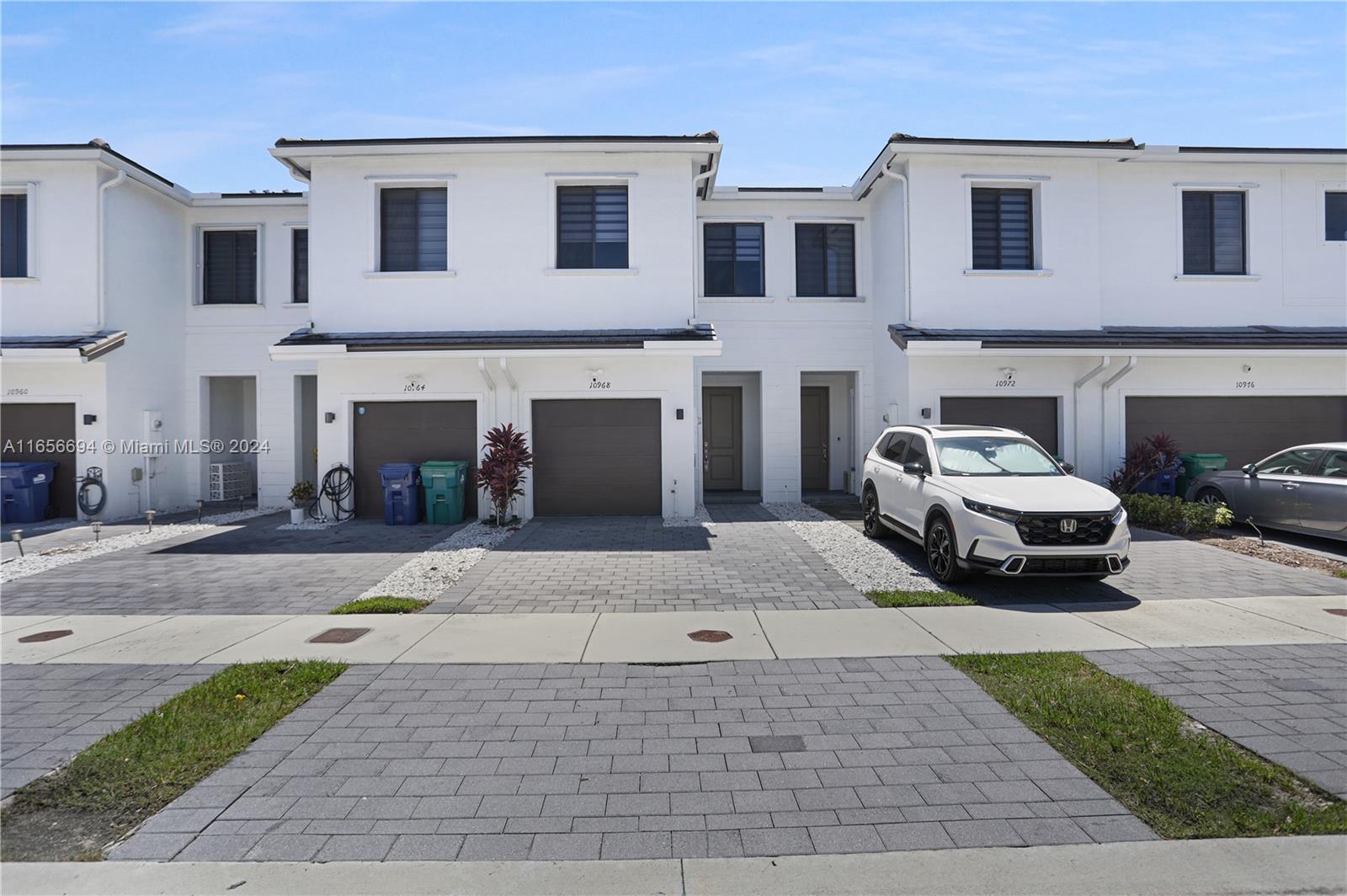 This newly built contemporary 2-story townhouse in the Landings offers the perfect experience blend of comfort and convenience. Featuring a 3-bed/ 2.5 bath with a conveniently attached one-car garage. Modern kitchen adorned with granite countertops and top-of-the-line stainless steel appliances, plentiful closet space. Step outside to the paved backyard and a beautiful pergola for you and your family to enjoy the weekend. Excellent community including a clubhouse, pool, 2 dog parks, and outdoor fitness area. Only minutes from excellent charter schools, top golf courses, and Black Point marina for the boaters... The Florida Keys are also a short drive away. Convenient location just off of Florida's Turnpike and U.S. 1. Pets welcome!  Don't look any further. This is the one!