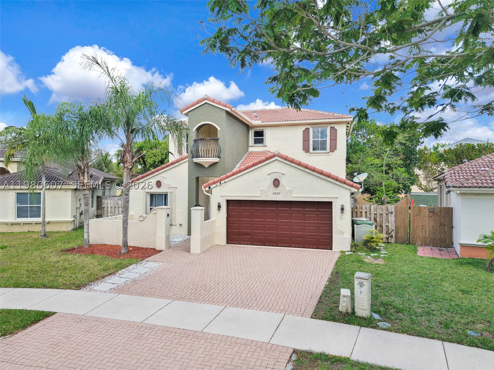 Welcome to luxury living in the highly desirable Granada Estates! This stunning 5-bedroom, 3-bath home offers over 3,000 sq. ft. of beautifully designed living space and a spacious two-car garage. The thoughtfully designed floor plan flows effortlessly from the elegant living room to the formal dining area and inviting family room, while a versatile loft provides the perfect space for a game room, office, or additional lounge. The impressive primary suite is a private retreat, featuring a generous bedroom, dedicated study, private balcony, and a spa-inspired bathroom with a soaking tub and separate shower. The chef’s kitchen is designed to impress with quartz countertops, stainless steel appliances, and ample space for cooking and entertaining. Porcelain tile floors enhance the main living areas, while rich bamboo flooring adds warmth upstairs. The home also includes hurricane shutters on all doors and windows for protection during storms. Step outside to your own private oasis—an expansive fenced yard filled with mature fruit trees, perfect for relaxing or entertaining. Homes of this size and quality in Granada Estates rarely come available. Low HOA - HOA covers front and back lawn maintenances. Don’t miss your chance, schedule your private showing today before this exceptional property is gone!