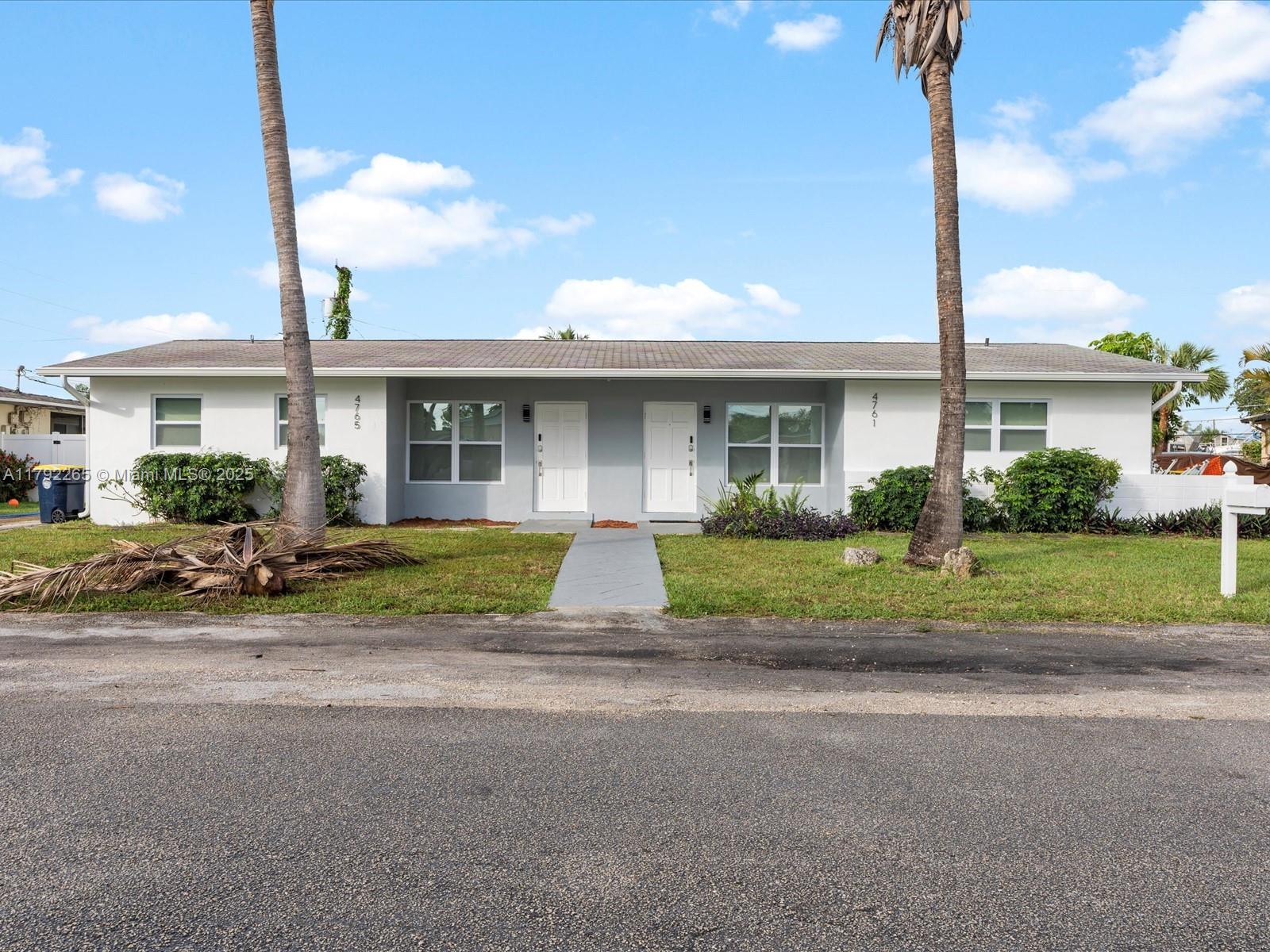 One of a kind duplex with all around upgrades. New Centralized ACs, appliances and tastefully renovated kitchens, bathrooms and floors. One unit is a true 3 bed, 2 bath with very large, PRIVATE backyards consisting of a brand new pool with a heater as well, expansive turf entertainment. The second unit is a 2 bed and 2 bathroom with a covered patio and same size private backyard. Within walking distances to houses of worship and convenient stores. Within minutes to main thoroughfares such as Florida Turnpike, 441 Rd, and i-95. Attractions like Hard Rock Guitar Casino & Resort, DOLCE Hotel, Dania Pointe Shopping Center, and top restaurants highlight the area. Ample parking at the front and on the side of the units. Unit 4761 has a pool and unit 4765 has room for one. Full Impact Windows