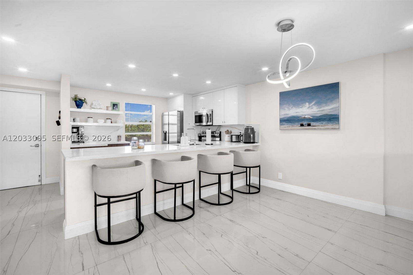 Beautifully renovated 2-bedroom, 2-bath lakefront condo in the heart of Dania Beach. This move-in-ready residence features a modern open-concept design with Italian porcelain tile flooring throughout, quartz countertops, European-style cabinetry, stainless steel appliances, and contemporary finishes that create a bright and sophisticated living space.

Enjoy peaceful lake views from the fourth floor while taking advantage of community amenities including a pool, sauna, and assigned parking with guest parking available. The well-maintained community offers a tranquil setting while remaining close to everything South Florida has to offer.

Ideally located just minutes from Hollywood Beach, Dania Pointe, Fort Lauderdale-Hollywood International Airport, I-95, and I-595. Walk to dining, shopping, entertainment, and The Casino at Dania Beach. Rent includes water, sewer, trash, association fees, and pool maintenance.

All ages welcome. No pets permitted. Exceptional location, modern upgrades, and beautiful water views make this a standout rental opportunity.
