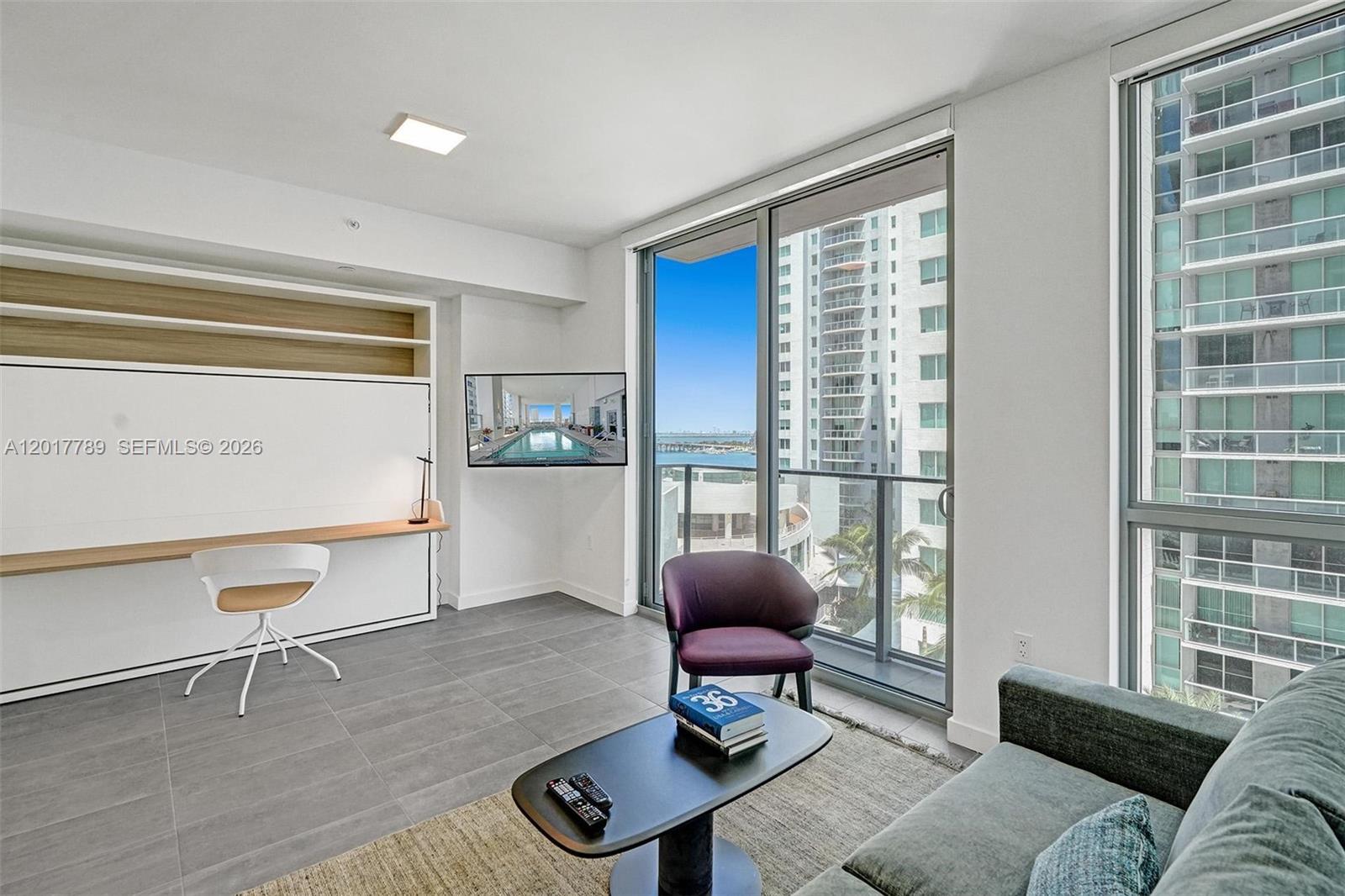 Downtown Miami living at its finest! The Studio PAD features a queen-size Murphy bed and a convertible full-sized bed, making it perfect for various living situations. You’ll have access to a full-size refrigerator, microwave, dishwasher, two-burner cooktop, garbage disposal, and in-unit washer and dryer. The smart floor plan is designed to maximize functionality and includes a charming Juliet balcony. Location is key—this studio is just steps away from the Bayside Marketplace and Kaseya Center, and it’s conveniently close to the Brickell Metromover. The building's amenities are impressive, offering a pool, fitness center, lounge bar, and private meeting rooms with co-working space. It's an ideal setting for investors, students, or professionals seeking a vibrant lifestyle in the heart of Miami!