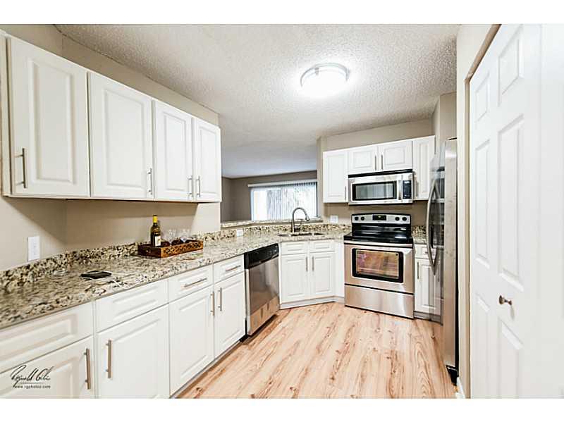 Totally renovated 2/2. Brand new kitchen with stainless steel appliances and granite counter tops. Wood flooring in living areas and carpet in bedrooms. Serene lakeview from patio. Easy to show. Please use show assist. The owner of the loan requires that  all prospective buyers of be pre-qualified for a mortgage through Skyline Home Loans. Please see attachment.