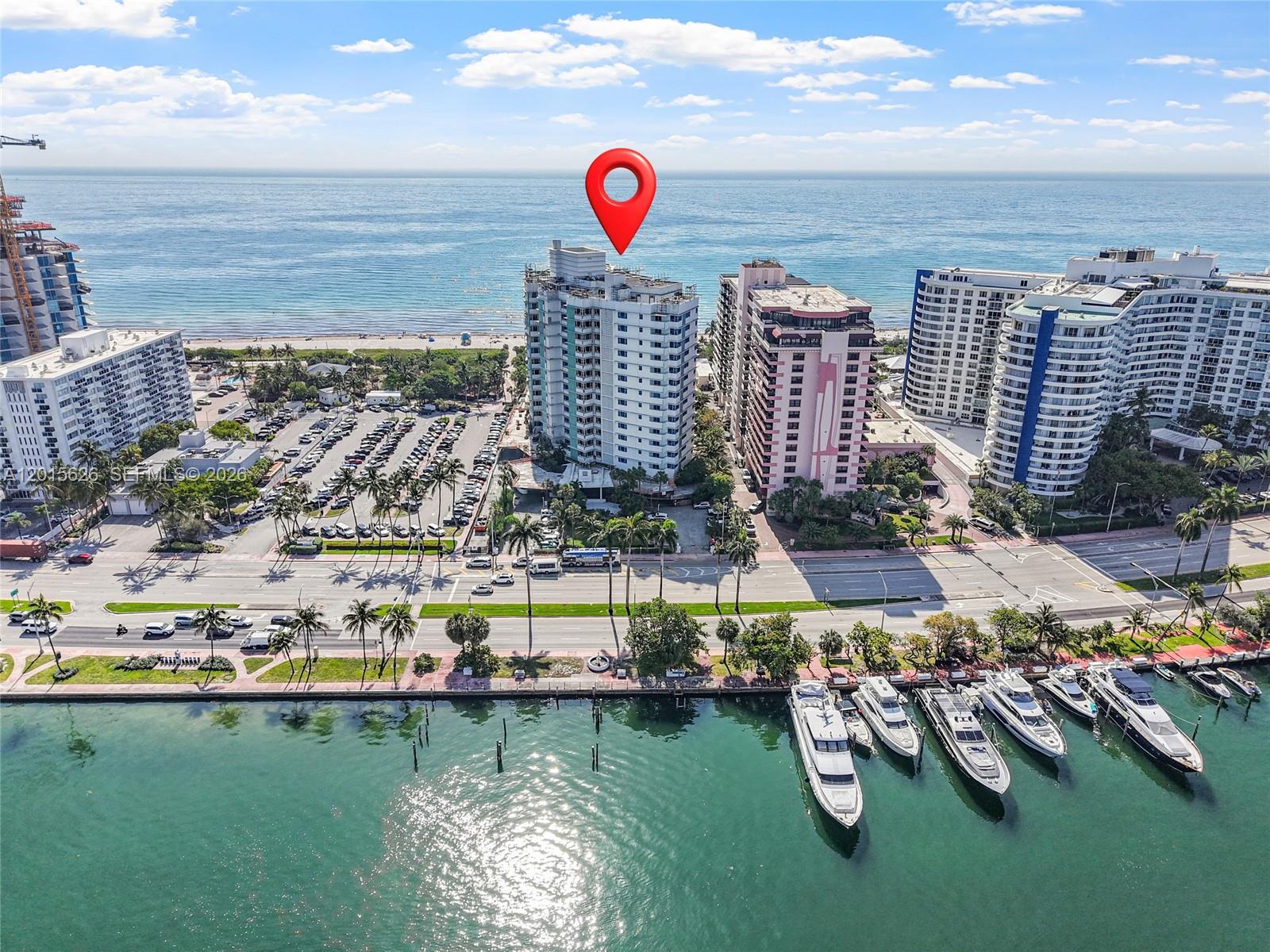 This extraordinary direct oceanfront penthouse offers a scale, position, and level of opportunity rarely available in today's market. 6,584 sf of interior living space and 2,884 sf of terraces with uninterrupted Atlantic Ocean views to the east and sunset vistas over Indian Creek and the Miami skyline to the west. This penthouse lives like a private oceanfront estate in the sky. Expansive entertaining spaces, oversized bedroom suites, and floor-to-ceiling exposures create a dramatic canvas craft one of Miami Beach's truly iconic residences. Fully permitted design plans are included, offering a seamless path to modernization and customization while preserving the property's rare scale and irreplaceable footprint. The residence is situated within one of Mid-Beach's most substantial oceanfront enclaves, spanning multiple beachfront acres along a coveted stretch bordered by the Atlantic Ocean and Indian Creek. The building is nearing completion of an extensive transformation tied to its 40/50-year recertification, enhancing the property's long-term quality, safety, and stature. Recent upgrades to the residence itself include brand-new hurricane-impact windows throughout. Enjoy a full-service lifestyle with 24h concierge and valet, a designed pool deck, fitness center, cabanas, outdoor entertaining areas, and private beach access with dedicated beach service. Maintenance includes all utilities. The offering also includes same-floor storage and two assigned garage parking spaces.