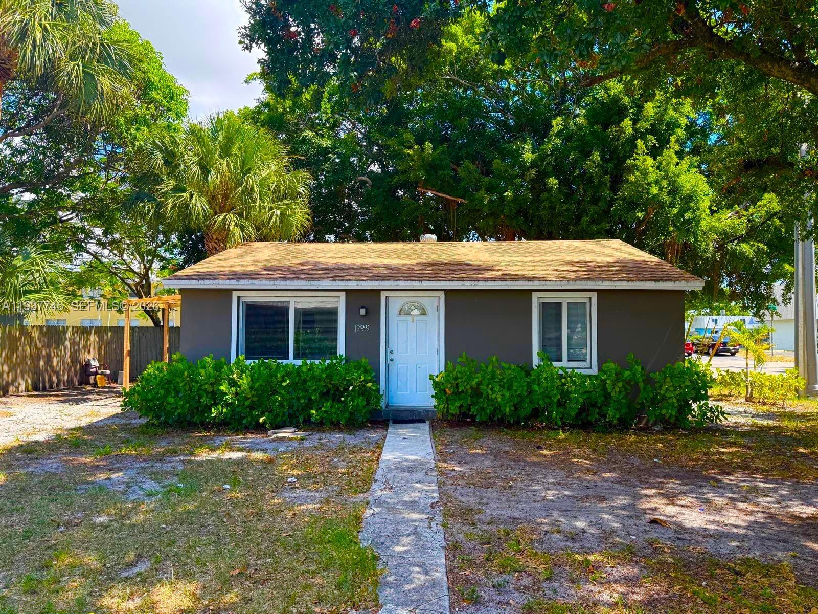 BEAUTIFUL 2BD/1BA CORNER HOME FOR SALE – OAKLAND PARK, FL! Charming single-family residence in a peaceful, family-oriented neighborhood in vibrant Oakland Park, just north of Fort Lauderdale. This 1953-built gem spans 780 sq ft on a generous 5,958 sq ft corner lot, offering modern updates, tile flooring, and a large yard ideal for relaxation or entertaining. Perfect for first-time buyers or investors in this cozy town known for its booming main drag, diverse real estate, and convenient access to South Florida's attractions!