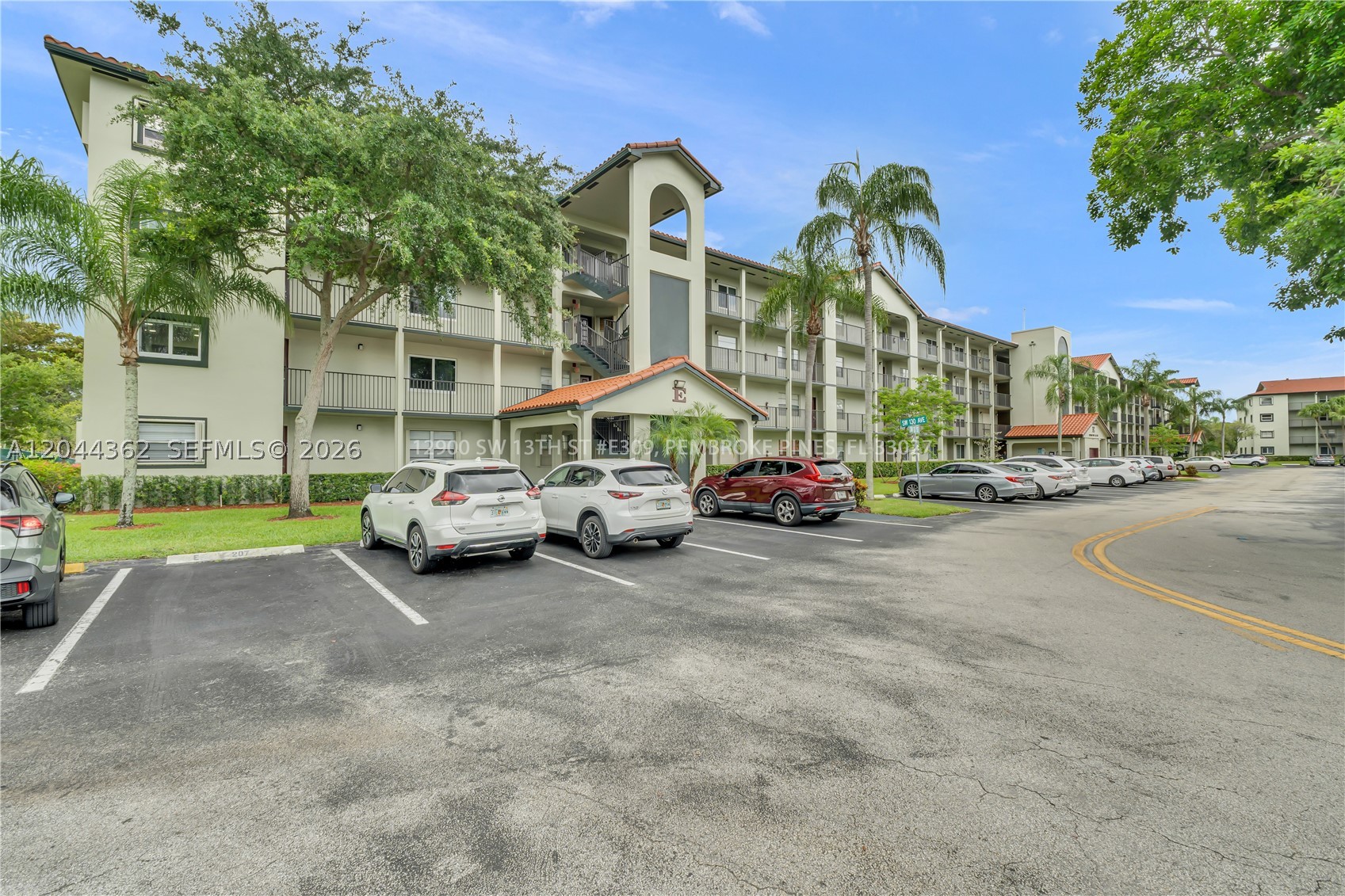 Stunning, fully renovated 2-bedroom, 2-bathroom split floor plan with breathtaking water views! This spacious residence has been beautifully updated from top to bottom and is truly move-in ready.

Features include recessed lighting, modern baseboards, elegant flooring, a gourmet kitchen with granite countertops, soft-close cabinetry, updated bathrooms, a newer A/C system, water heater, in-unit laundry, and impact-resistant windows and doors throughout.

There’s absolutely nothing to do—just bring your toothbrush and start enjoying the lifestyle you deserve!

Residents enjoy an exceptional array of amenities, including golf, tennis, a state-of-the-art fitness and spa center, heated swimming pools, and barbecue areas. The spectacular clubhouse offers weekly live entertainment, daily movie screenings, and a full calendar of social activities. Stay informed with the community’s monthly newspaper, featuring village events and cruise departure schedules from Fort Lauderdale and Miami.

This is a truly exceptional unit that won't last long! Call or text today to schedule your private showing before it's under contract.