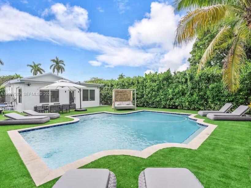 Recently renovated and designed by a famous French designer- Attractive contemporary and minimalist look. This great 1700 sq. ft. 4  bedrooms / 2 bath house is conveniently located in the peaceful and picturesque "Buena Vista"- Few minutes from world known Design District offering trendy luxurious stores, fine restaurants and galleries. The private and sunny backyard perfect for relax evenings and barbeque week end, enjoying the great looking pool. The modern kitchen with the best appliances is opened on the cozy living room. The fenced garden offers a relaxing terrace, a large pool and garden furniture. 2 cars can park on the closed driveway. 
Centrally located from Miami International airport, Brickell, Wynwood, Miami Beach, Coral Gables, the best schools. This is a great choice.