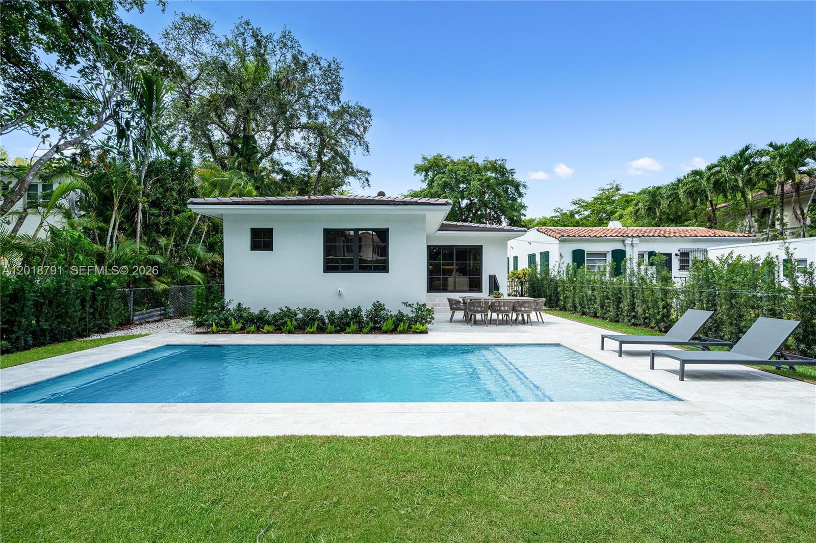 Completely reimagined and brought down to the studs, this beautifully renovated home sits just one block from De Soto Fountain and Venetian Pool, and is a short walk to The Biltmore Hotel.

Extensively upgraded throughout with high-quality finishes, including impact windows and doors, a new roof, flooring, kitchen, and bathrooms, along with PVC plumbing, a full electrical rewire with a new panel, and new air ducts. The open floor plan overlooks a newly constructed saltwater pool, set within a large yard and patio that are ideal for entertaining.

3 bedrooms and 4 bathrooms, with each bedroom featuring its own en-suite bath and walk-in closet. An additional spacious flex room is perfect for an office, formal living, or lounge.