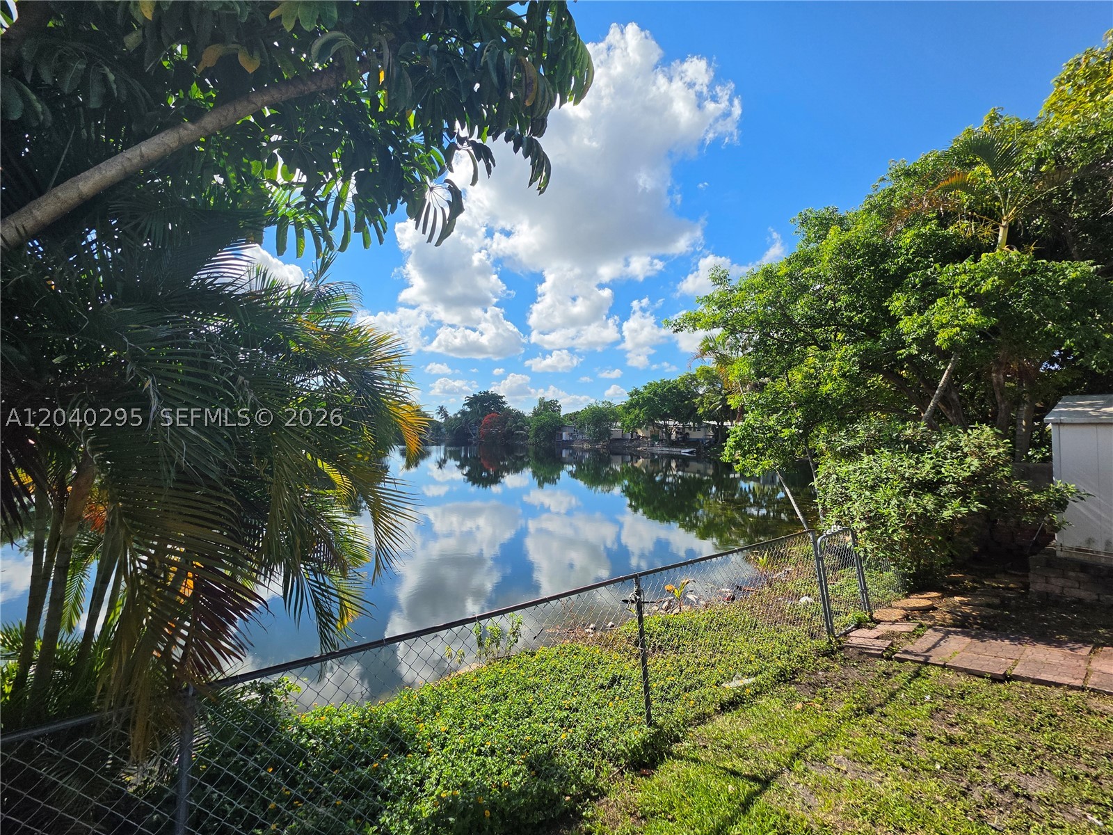 Investor opportunity with tranquil lake views in University Lakes! This waterfront mobile home is currently configured with multiple living areas, including a 2-bedroom/1-bath layout and two additional 1-bedroom/1-bath living spaces. The University Lakes community offers outstanding amenities, including two community pools, basketball court, tennis courts, volleyball court, multiple playgrounds, and scenic lakefront common areas. Conveniently located near shopping, dining, schools, and major roadways.

Property is being sold As-Is. Land not included. Buyer responsible for conducting their own due diligence regarding park rules and regulations, lot rent and fees. Motivated Seller.