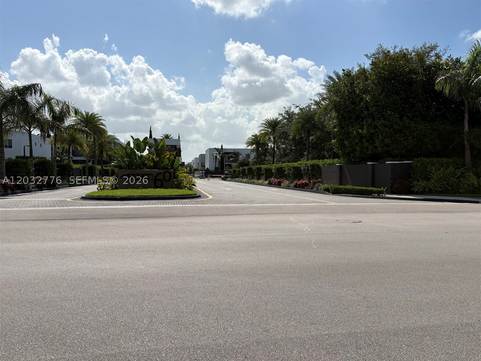Experience refined living in this exceptional 5-bedroom, 5-bath luxury residence located in the prestigious gated community of Modern Doral. Designed for both elegance and functionality, this spacious two-story home features soaring ceilings, an open-concept layout, abundant natural light, and premium finishes throughout. The gourmet kitchen is appointed with quartz countertops, high-end stainless steel appliances, custom cabinetry, and an oversized island that seamlessly connects to the main living and dining areas. One full bedroom and bath on the first floor provide the perfect space for guests or multigenerational living. Upstairs, the expansive primary suite offers a spa-inspired bathroom, generous walk-in closets, and private balcony access, while additional bedrooms provide comfort and privacy for family and guests. Enjoy South Florida living year-round in the beautifully designed backyard featuring a private pool, covered terrace, and outdoor entertaining area. Additional highlights include a smart home system, impact windows and doors, custom closets, upgraded flooring, a two-car garage, and ample driveway parking. Residents enjoy resort-style amenities including a clubhouse, fitness center, pool, playground, and 24-hour gated security. Ideally located near top-rated schools, Downtown Doral, CityPlace, premier dining, shopping, golf courses, Miami International Airport, and major highways.