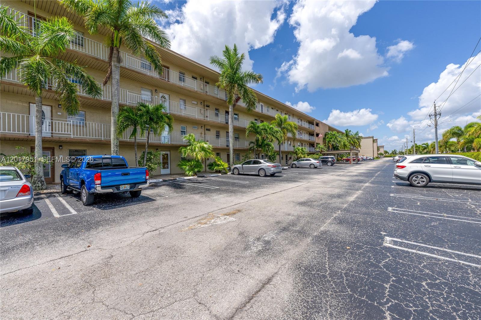 Completely renovated 2BR/2BA condo located in a desirable senior community! This stunning first-floor unit was stripped down to the studs and fully remodeled, including a brand-new electrical panel. Features include wood flooring throughout, quartz countertops, stainless steel appliances, hurricane impact windows and sliders, and modern finishes throughout.

Enjoy the convenience of your own private washer and dryer, available because this is a first-floor unit, plus your assigned parking space right at your doorstep. Relax on the extended patio perfect for bird watching, enjoying a glass of wine, or grilling outdoors.

Imagine retiring in the perfect haven or embracing an active lifestyle filled with endless possibilities. The main clubhouse is the heart of the community featuring two pools, billiards, a gym, shuffleboard, tennis courts, pickleball, theater, library, computer room, bingo, live shows, and more! A true social haven where every day brings something new.

Move-in ready and waiting for the perfect new owner!