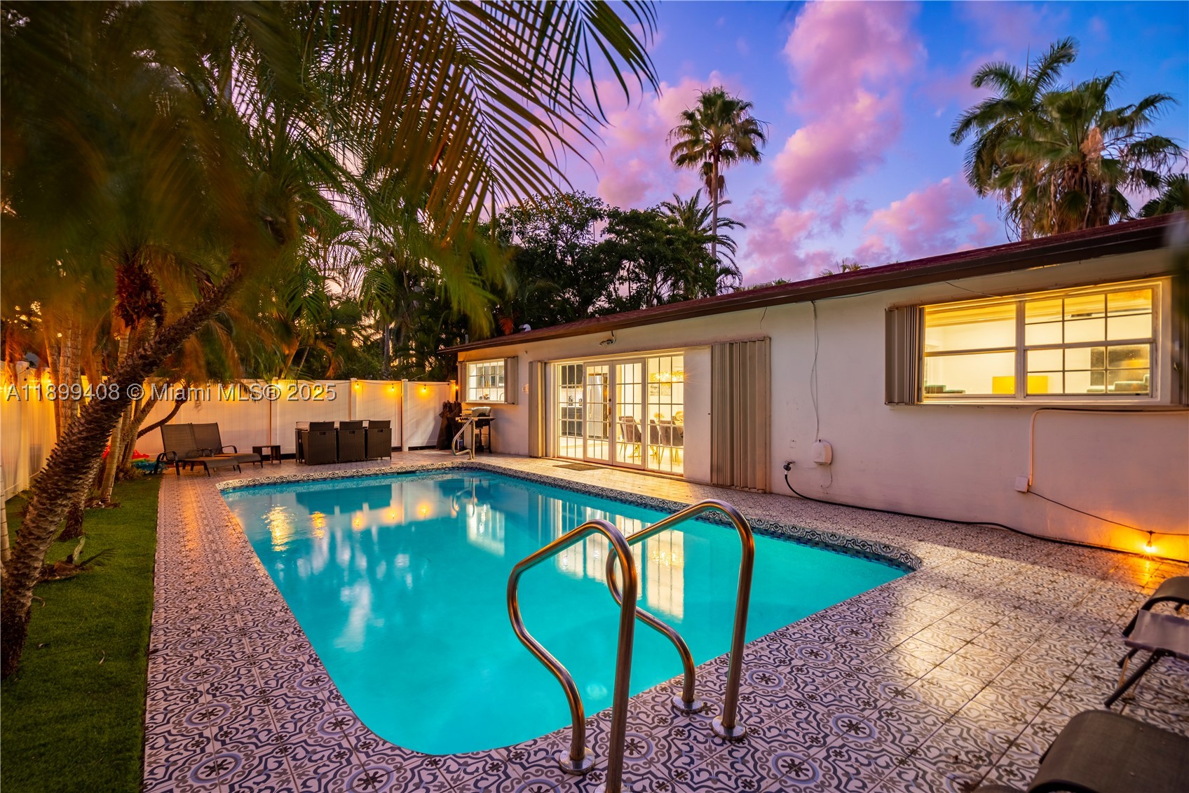 Discover your own tropical retreat just minutes from Hollywood Beach in this beautifully updated home. Featuring a bright open layout, modern kitchen and baths, and spacious living areas filled with natural light, this residence blends comfort and style. Step outside to a lushly landscaped backyard with a sparkling pool and plenty of space for relaxing or entertaining. Additional features include impact windows and a large circular driveway for convenience. Perfectly located east of US-1 near parks, dining, shopping, and the Intracoastal, ideal as a full-time home or vacation getaway.