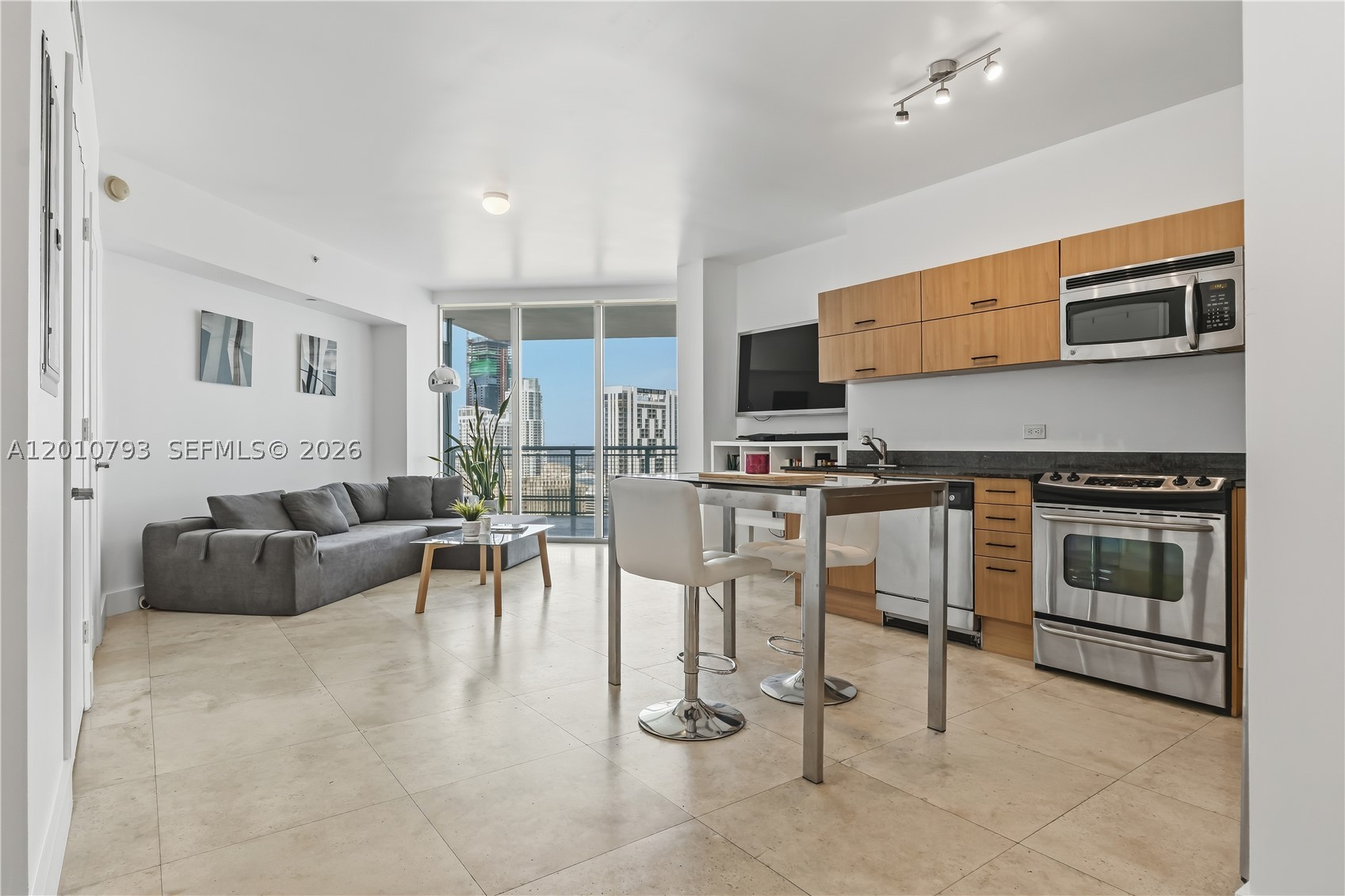 Experience the pinnacle of Miami living in this stunning 33rd-floor residence at the prestigious Wind Condo. This sophisticated one-bedroom plus den, one-bathroom floor plan offers a seamless blend of style and versatility, with the additional den serving as the perfect home office or guest space. From the moment you step inside, your eyes are drawn to the expansive floor-to-ceiling windows that showcase a breathtaking dual panorama of the glittering city skyline and the deep blue waters of the ocean.

Beyond the unit, the lifestyle offered by 350 S Miami Ave is truly unparalleled. Situated at the strategic crossroads of Downtown and Brickell, you are perfectly positioned to enjoy the best of both worlds. You are just steps away from the upscale shopping and fine dining of Brickell City Centre, the vibrant energy of the Miami Riverwalk, and the cultural heart of the city. Whether you are commuting via the nearby Metromover or exploring the local nightlife, everything you need is within reach.

The Wind Condo has been thoughtfully elevated with recently renovated lobby and amenity areas, providing an immediate sense of modern luxury and prestige. Residents enjoy access to a resort-style pool deck, a state-of-the-art fitness center, and serene social spaces designed for the urban professional.