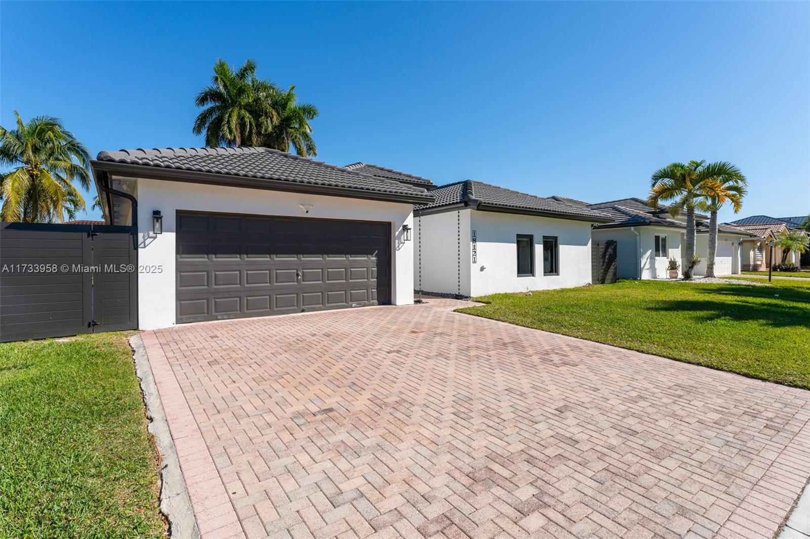 Stunning single-family home with 4 bedrooms and 3 bathrooms, fully remodeled and move-in ready. This spacious property features a split floor plan with living, dining, and family areas. The renovated kitchen includes a wine fridge, pantry, new stainless steel appliances, and a large island, perfect for entertaining. The primary suite boasts custom closets and an en-suite bathroom with a luxurious shower and tub. Enjoy the private backyard oasis with a sparkling pool, modern deck, and fenced yard, ideal for relaxing or hosting. Additional highlights: cemented side yard, new gates, and updated systems for efficiency. Located near top-rated schools, parks, shopping, hospitals, FL Turnpike, and Krome Ave. No HOA!